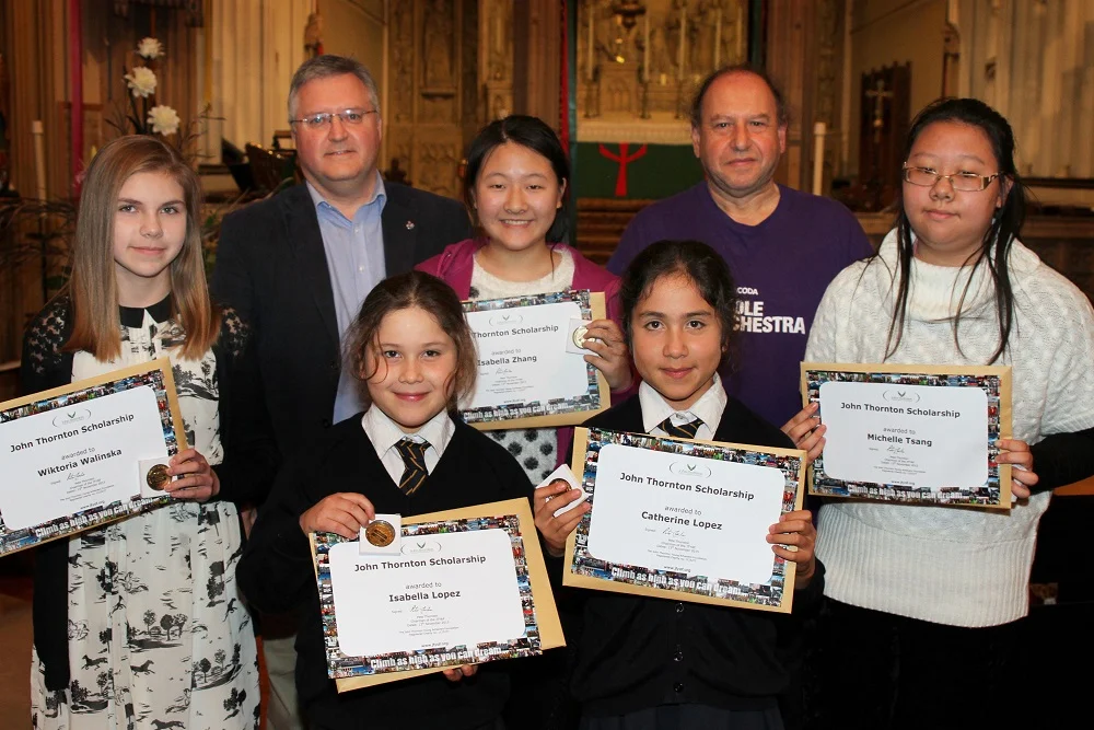 Coda Fiddle Orchestra at St Clement's Church, Boscombe ... 13.11.2015 ... photograph by Hattie Miles ... Geoff Beck, second left, presented John Thornton Music Scholarship Awards, Jack Maguire founder of the Coda Fiddle Orchestra is second left.