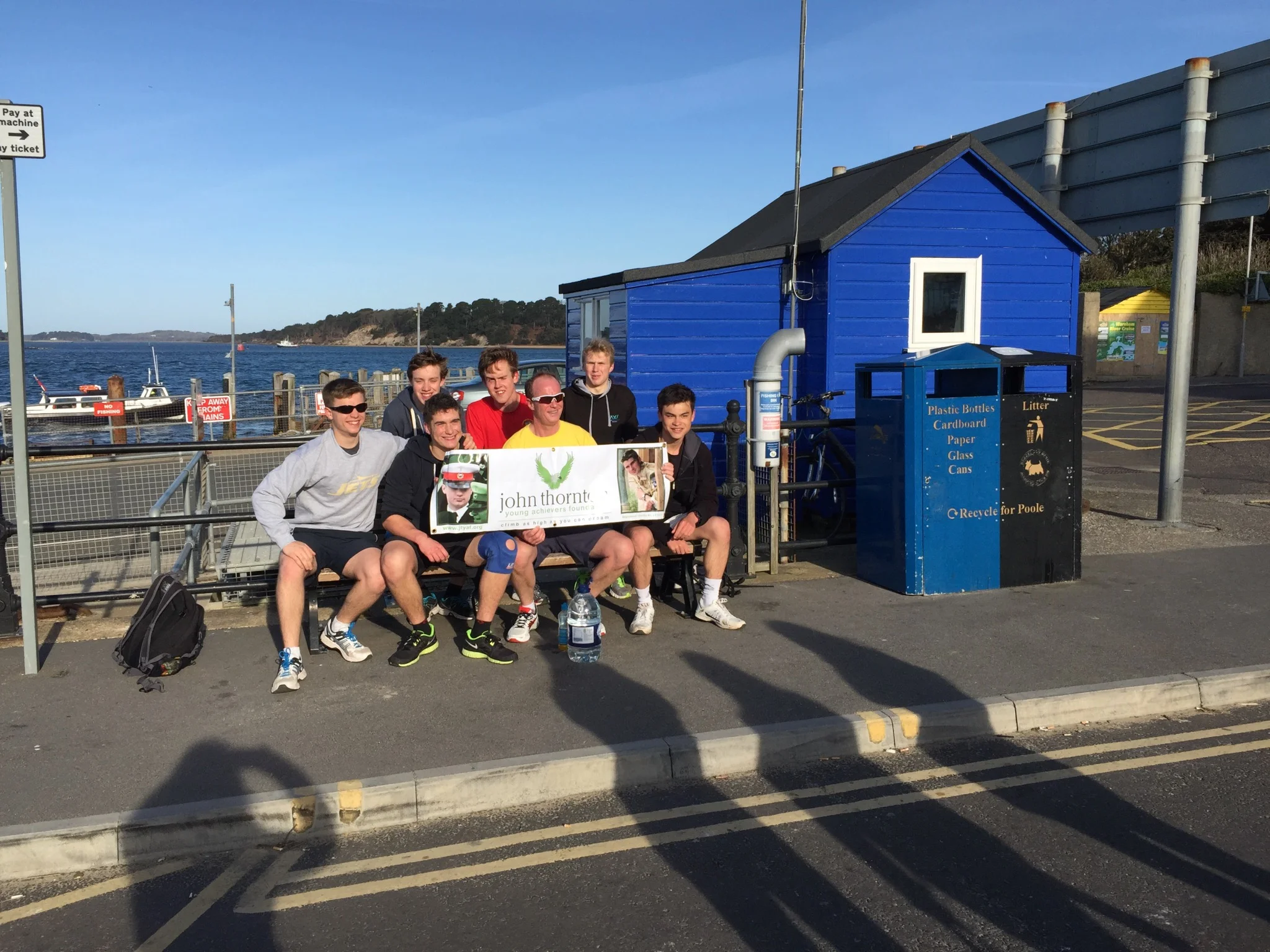 At the ferry, 9.5 miles in, still a team!