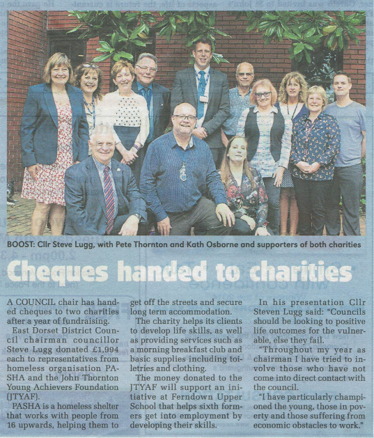 Cheques handed to charities