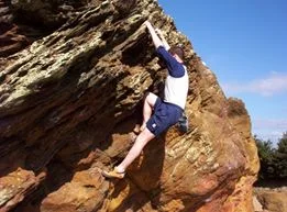 John bouldering at Agglestone Rock