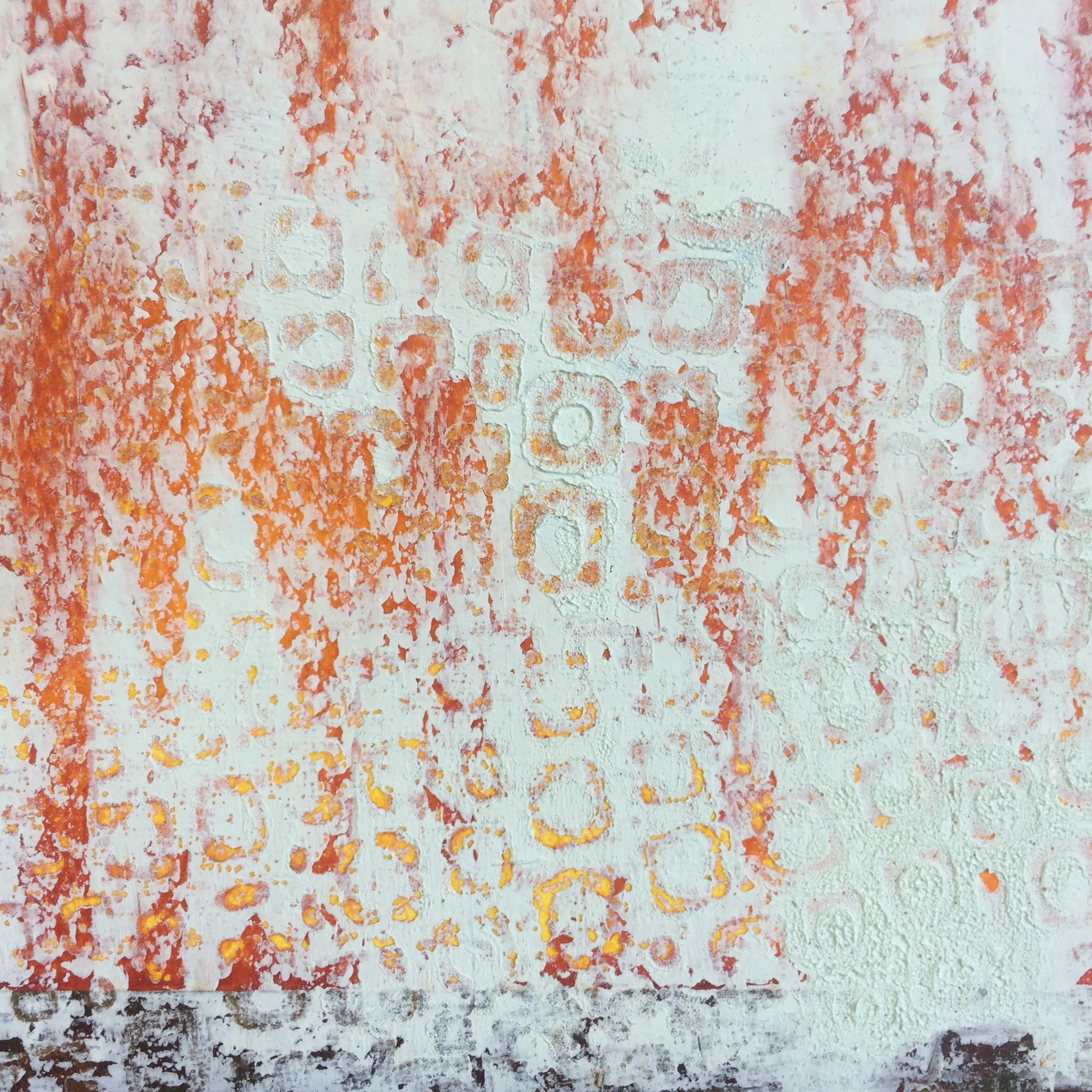 detail shot of painting in progress to show pattern achieved after pressing textured paper into the surface