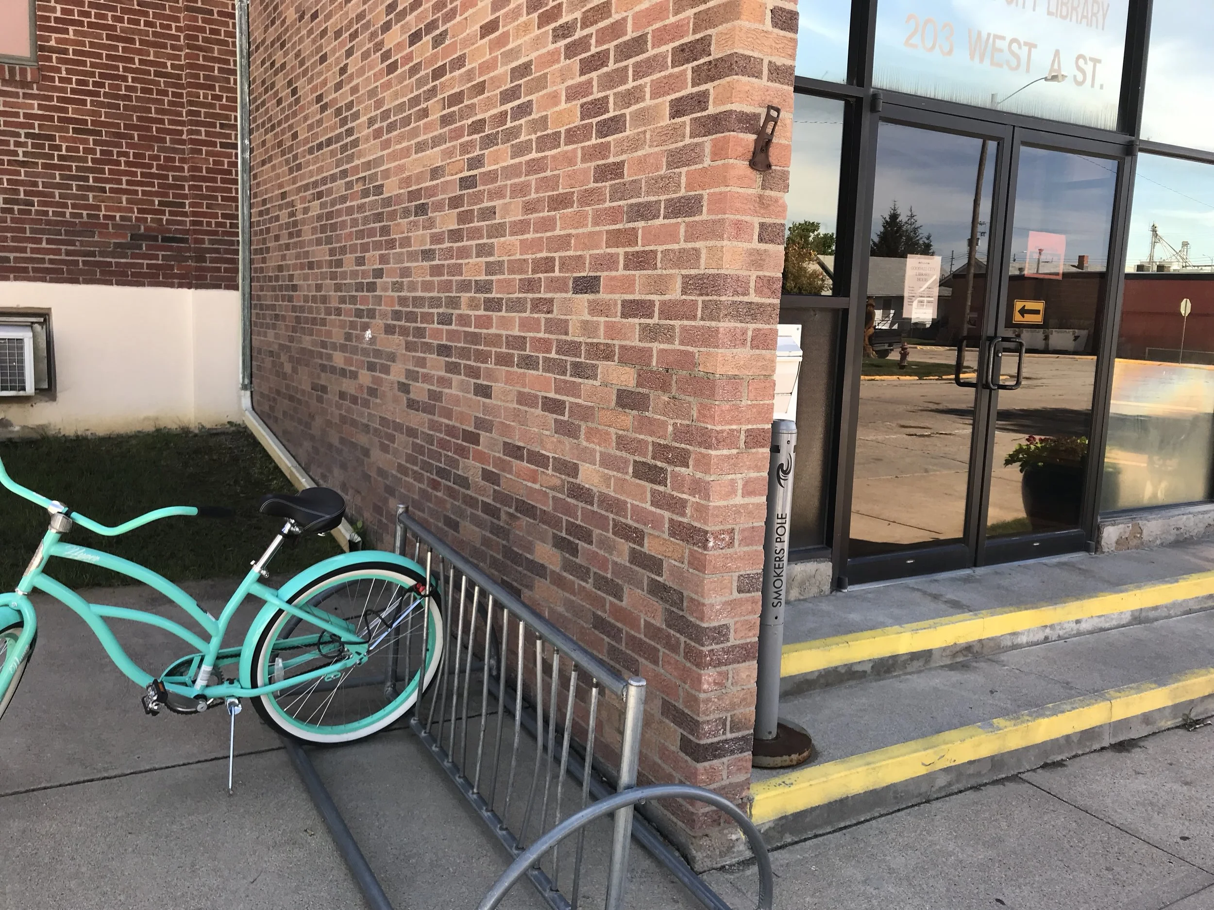 Gotta love this turquoise bike parked at the entrance to Ogallala’s public library.