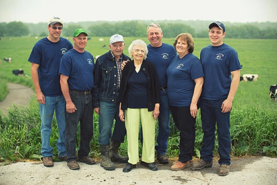 Left to Right: Eric Zinkievich, Ron Rodgers; founders Harold and Rose Gould; current partners John, Sue and Stephen Gould. Not pictured: Tim Bodine and Zak Griffith. Photo provided.