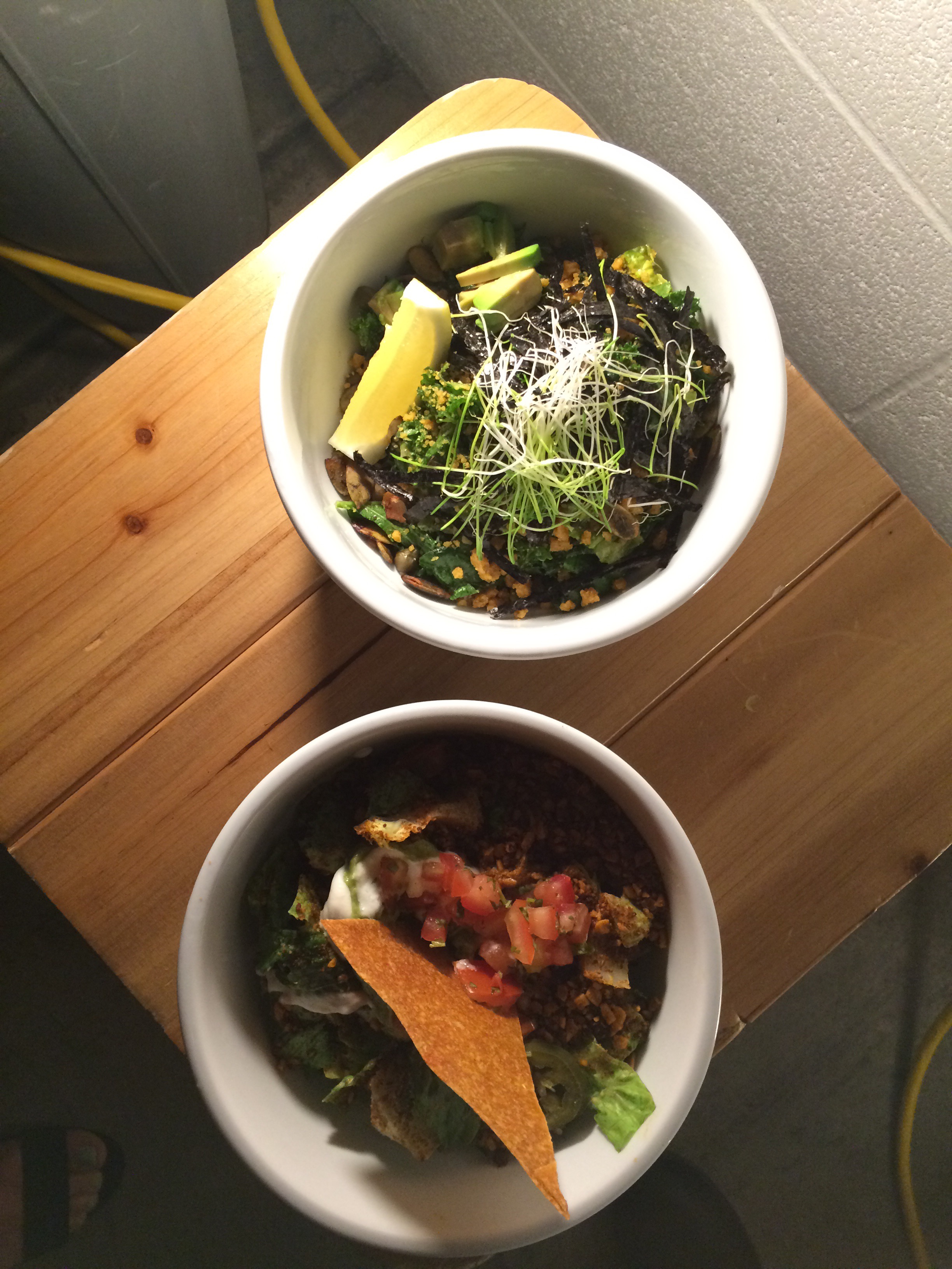 Fifth Course Seaweed Caesar Salad & Nacho Salad Seaweed Caesar- romaine, kale, seaweed ceasar dressing, avocado, capers, nori, sprouts, pumpkin seeds, pine nut parmesan. Nacho- romaine hearts, nacho cheese sauce, taco crumble, pico de gallo, cashew sour cream, guacamole, pickled jalapenos, tortilla crisps.