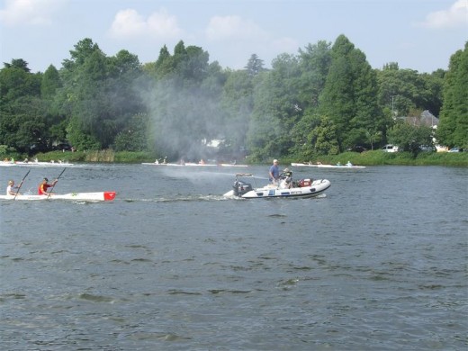 ENJOYING THE CHALLENGE: JCC members at Wemmer Pan thoroughly enjoyed the only high-altitude surfski race in the world, especially with numerous world-famous paddlers in the bunch. Martin van den Bergh (red top) and Morgan Ziervogel (white top) paddle away.