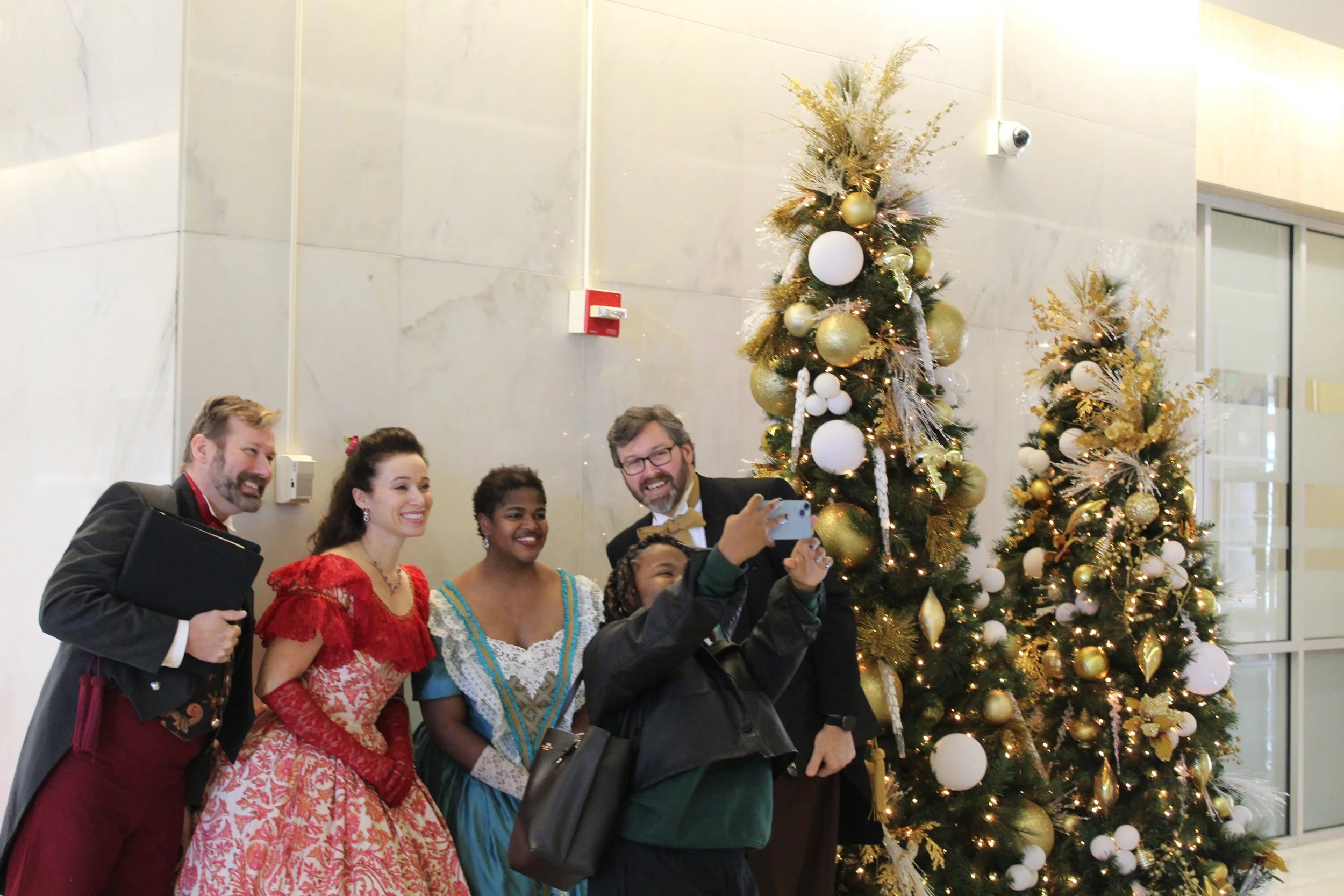 Closing Out the Year with Cocoa, Carolers, and Community Goals