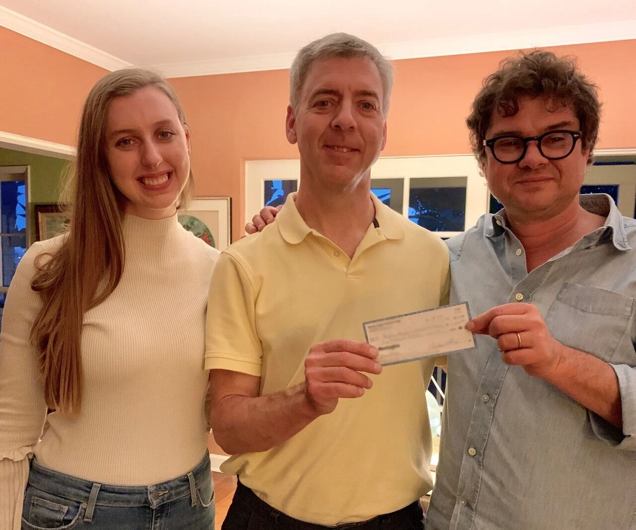 Luca Dotti accepting a donation to the Audrey Hepburn Children’s Fund after filming LIGHTS, CAMERA, LOCATION! in Los Angeles, California.