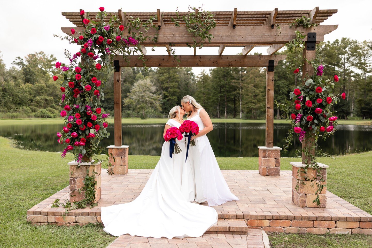 ✨ Sealed with a kiss and surrounded by nature's bliss. 💋💍💍🌸 Cheers to Lauren &amp; Marlene! ❤️

&mdash;NOW BOOKING 2024 &mdash;
www.DreamscapePhotography.com

Amazing Vendor Team:
Venue: @cypresscreekfarmhouse
Planner: @emilymaines 
Photo &amp; V