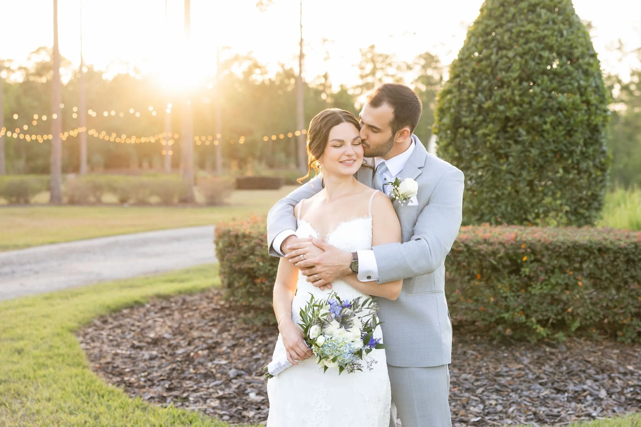 Golden hour wedding portrait of a couple by Dreamscape Photography in Central Florida.