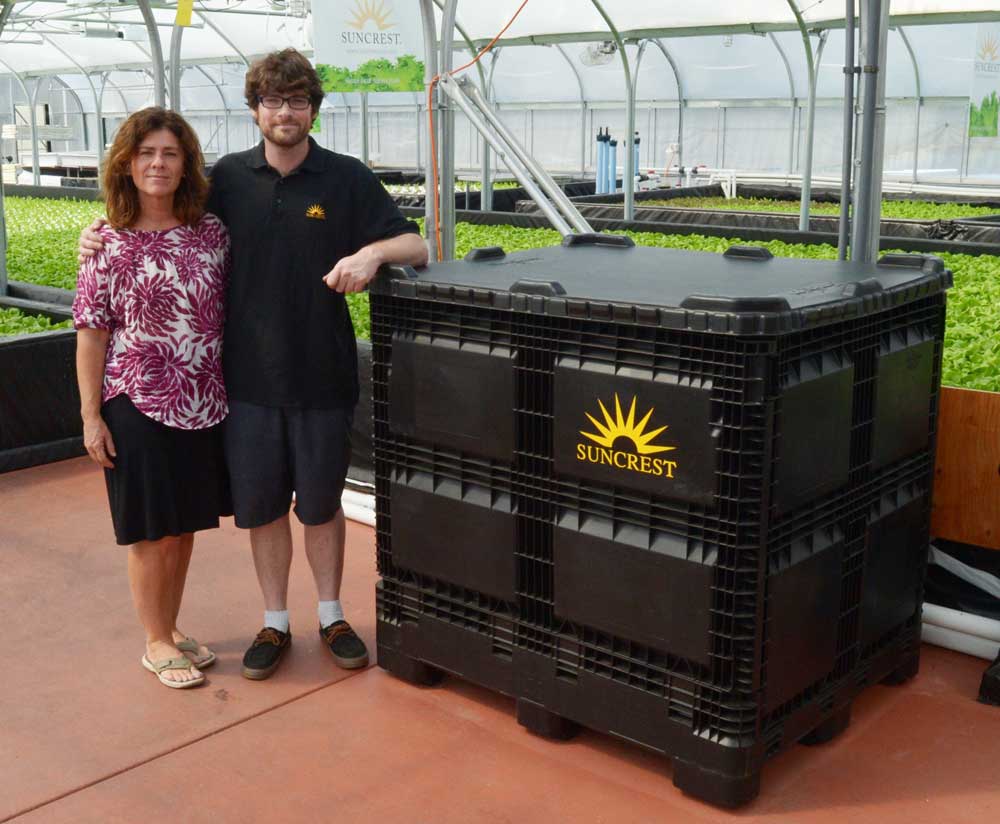 Maureen Murphy, co-owner of Whidbey Growers, LLC. on Whidbey, with her son Sam Rowley, a proud grower of Suncrest™ Bibb.