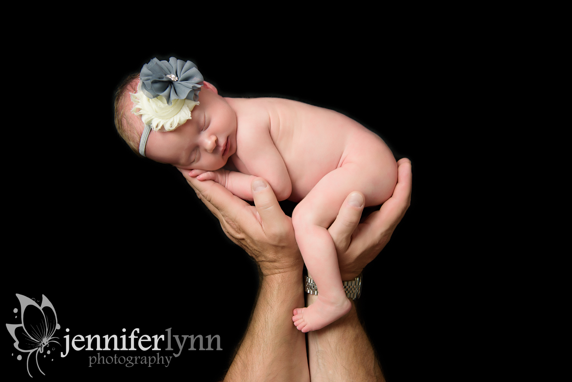 Newborn Girl Dad's Hands Black