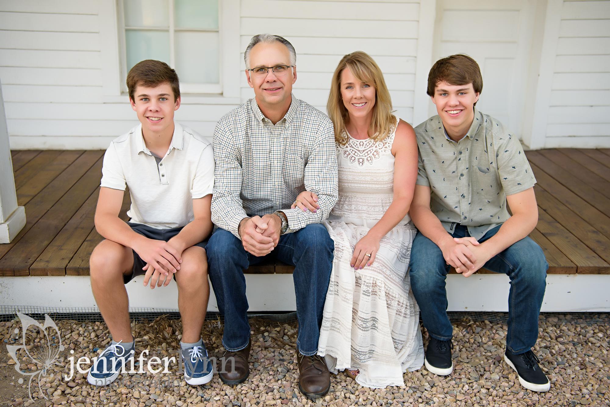 Family Sitting on The Porch