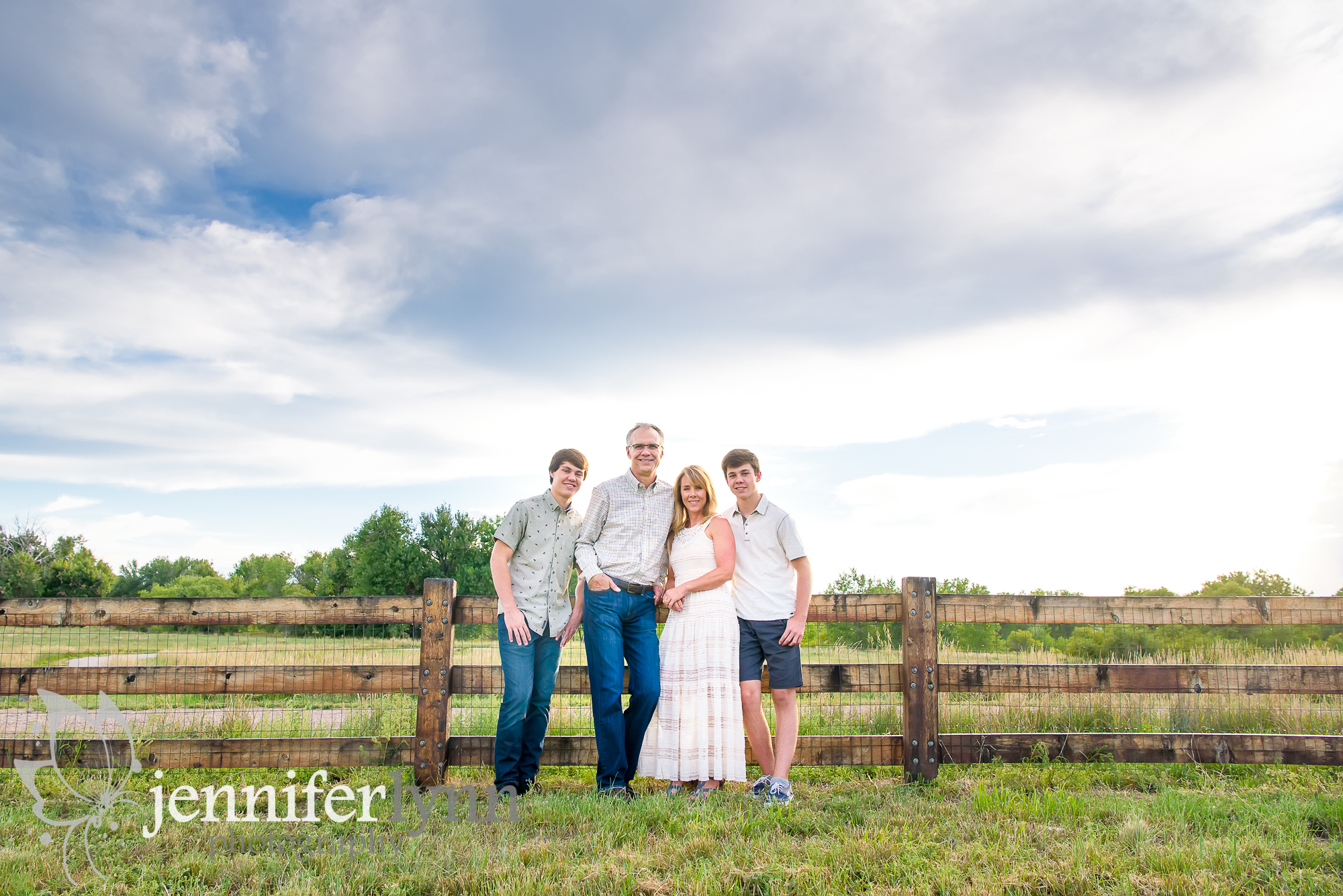 Family Fence Blue Sky Country Setting