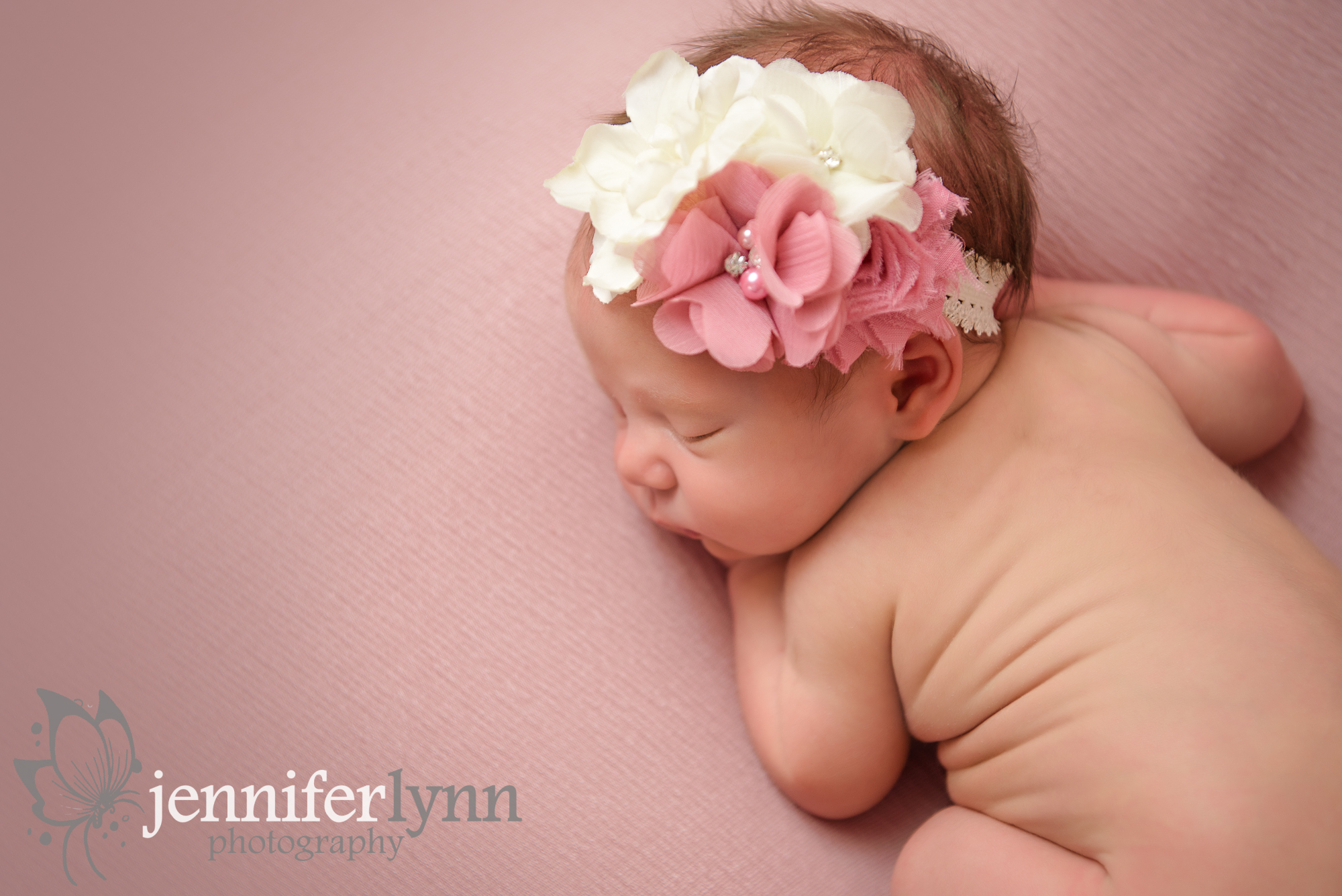 Newborn Girl Curled on Tummy Pink Blush Fabric