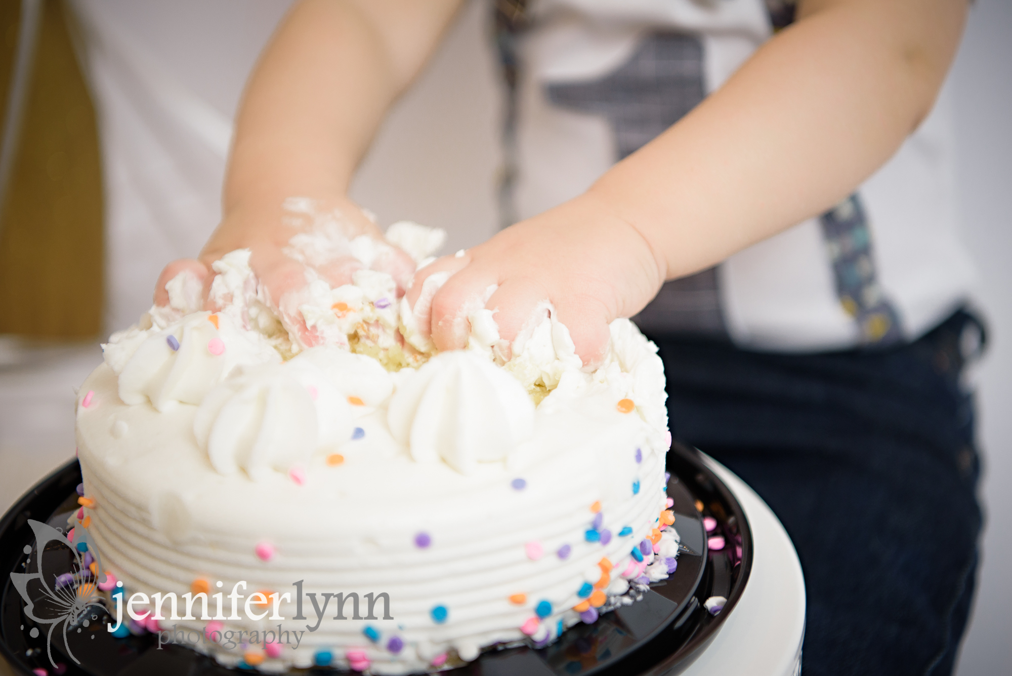 Baby Hands Digging Into Cake