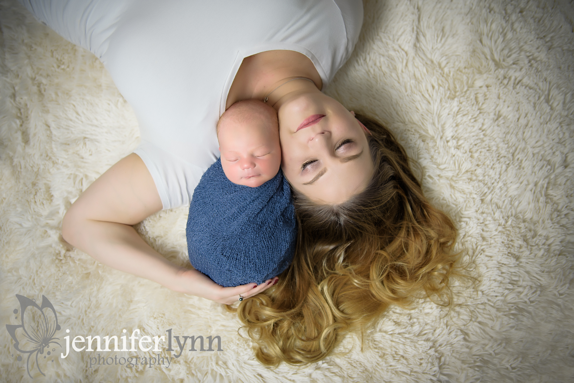 Newborn Boy Lays Next to Mom's Face