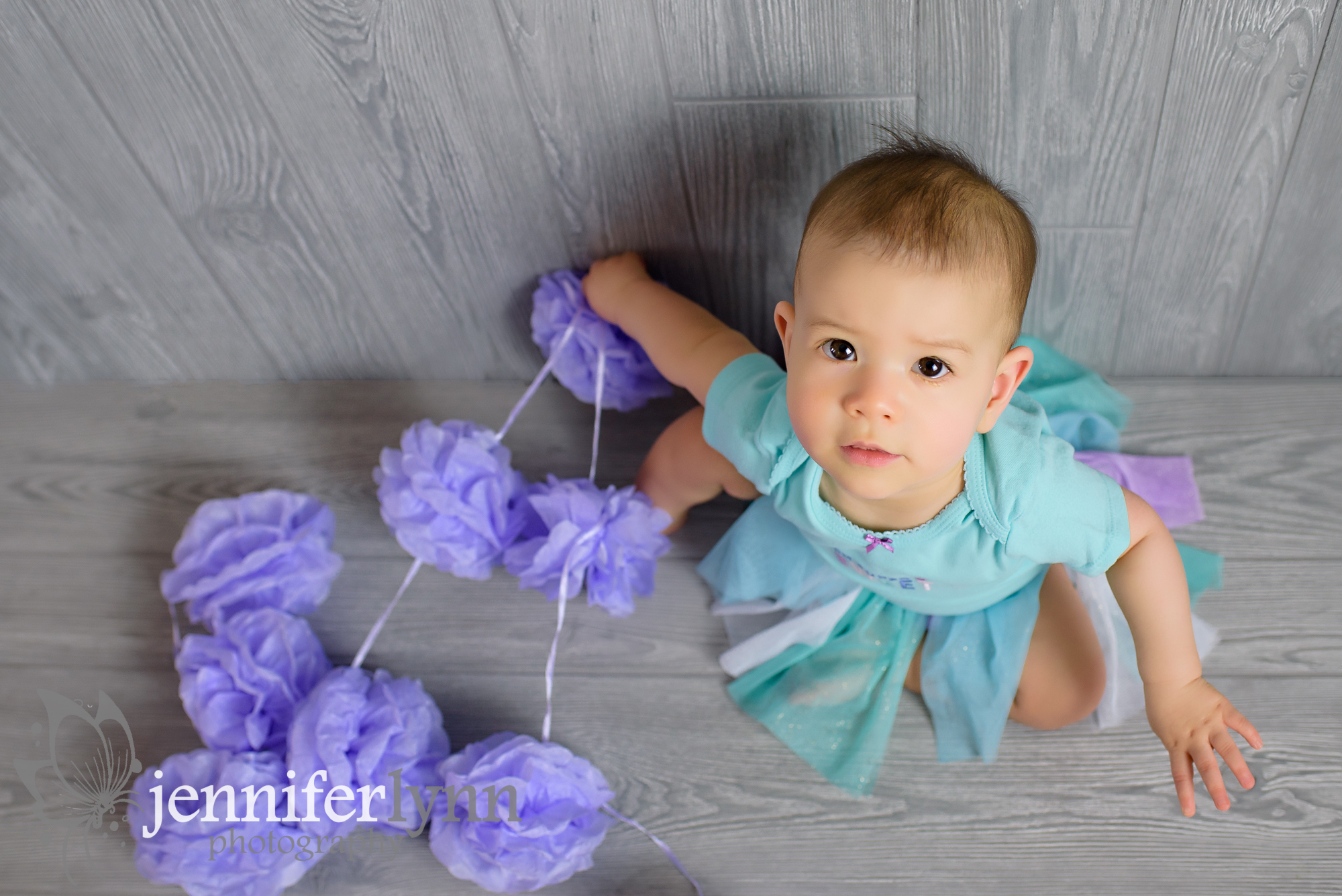 Baby Girl Purple Gazing Up