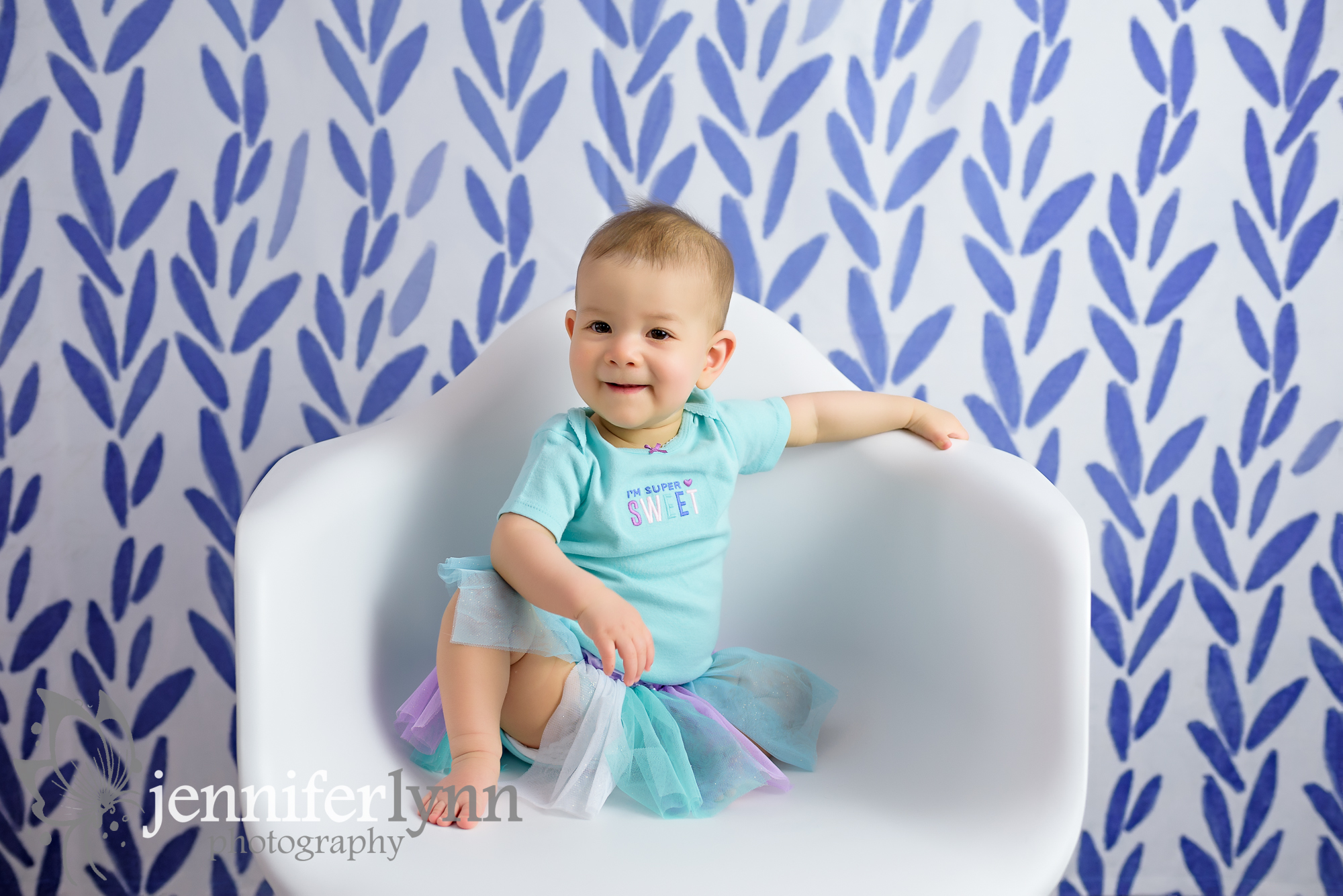Baby Girl White Chair Purple Background