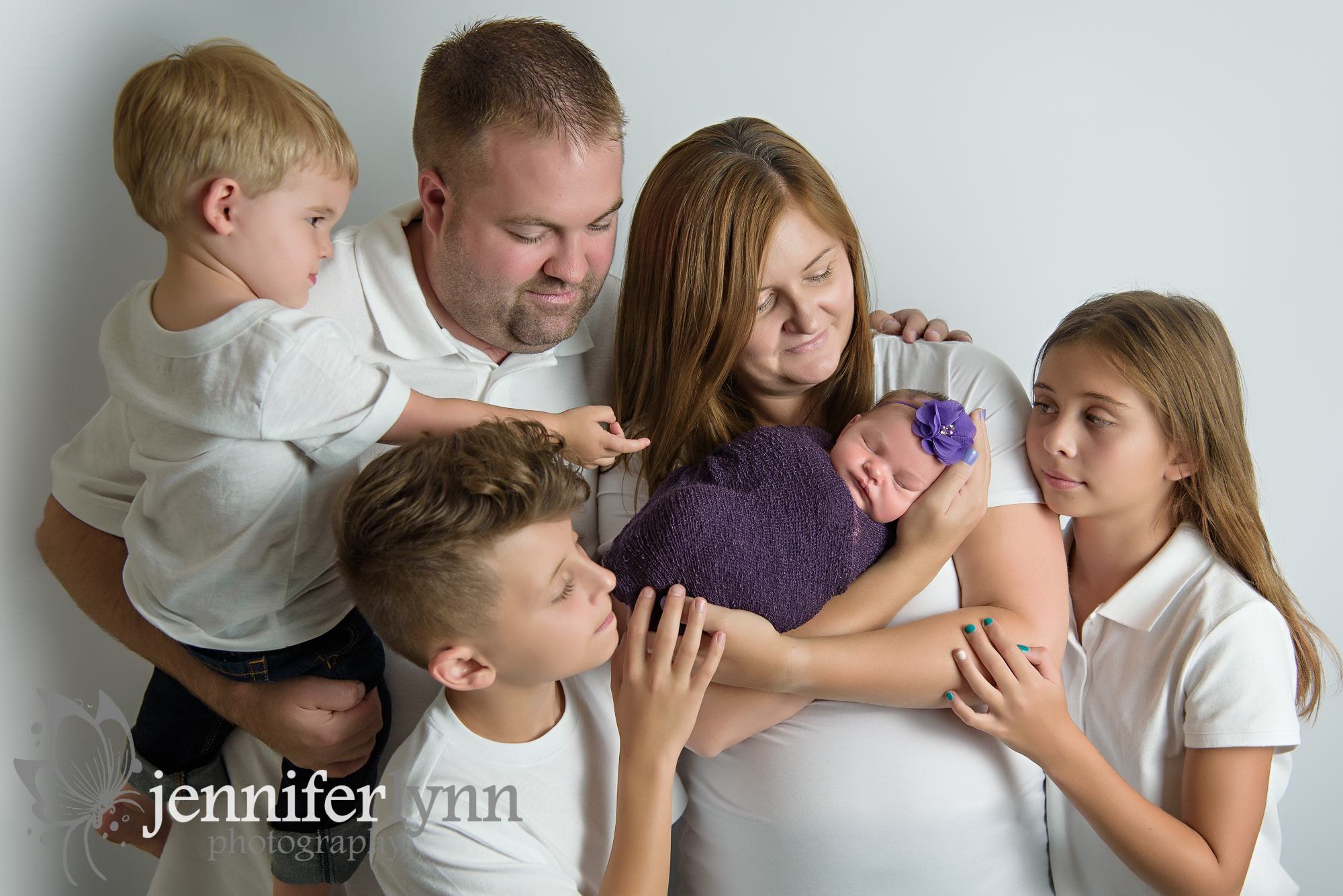 Family of six newborn girl photo purple