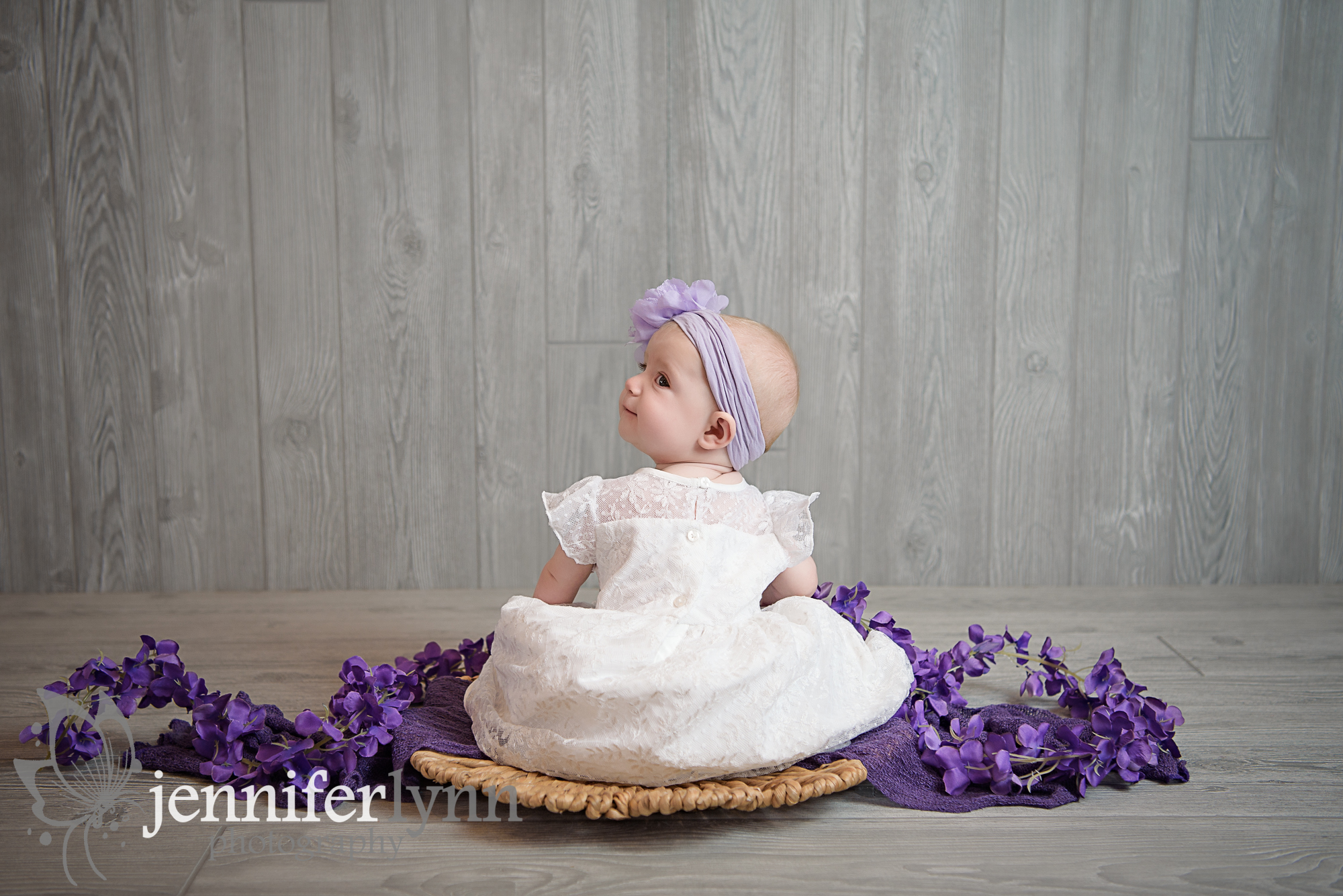 Baby Sitting Purple and White Backwards