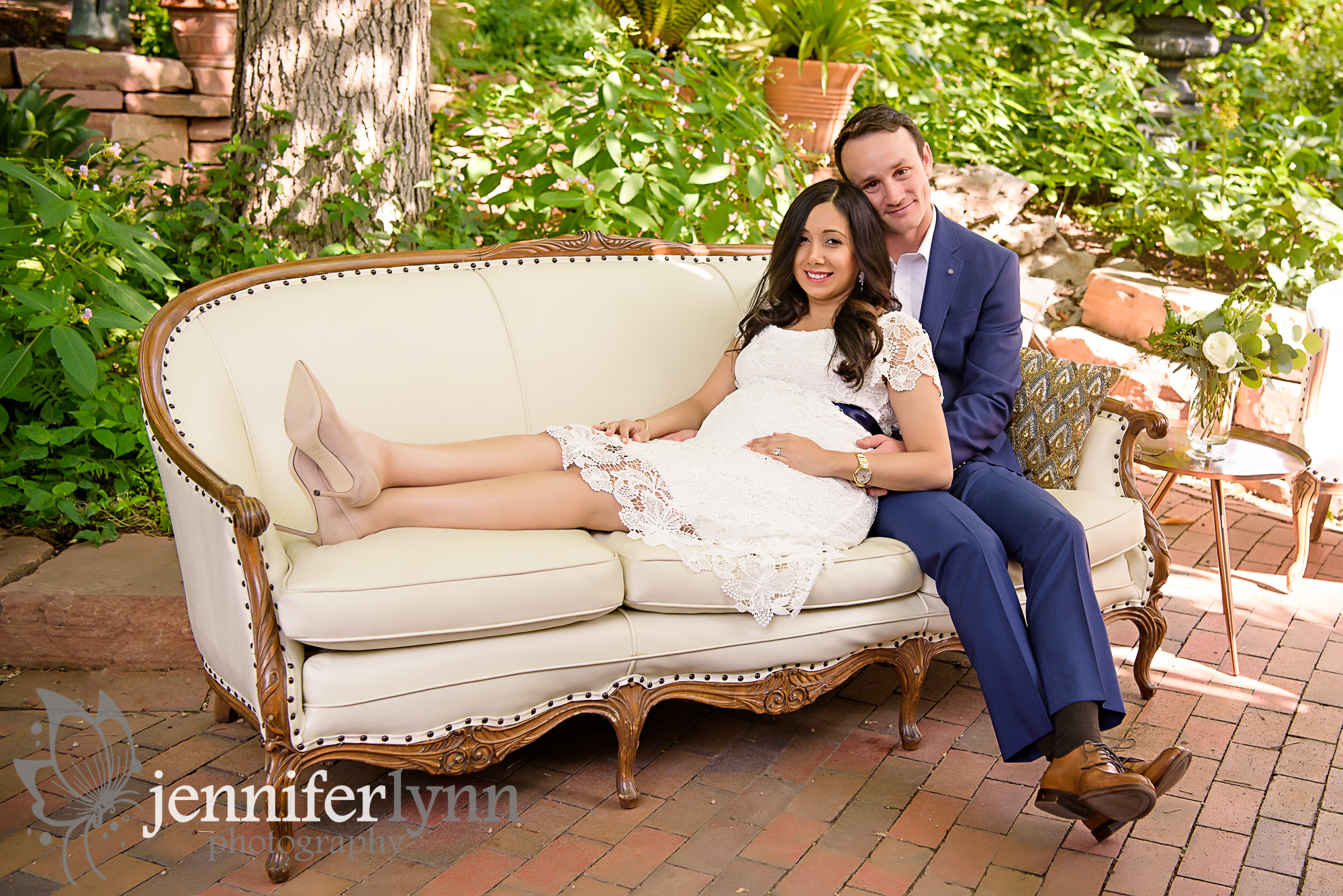 Maternity Couple on Vintage Couch Gardens
