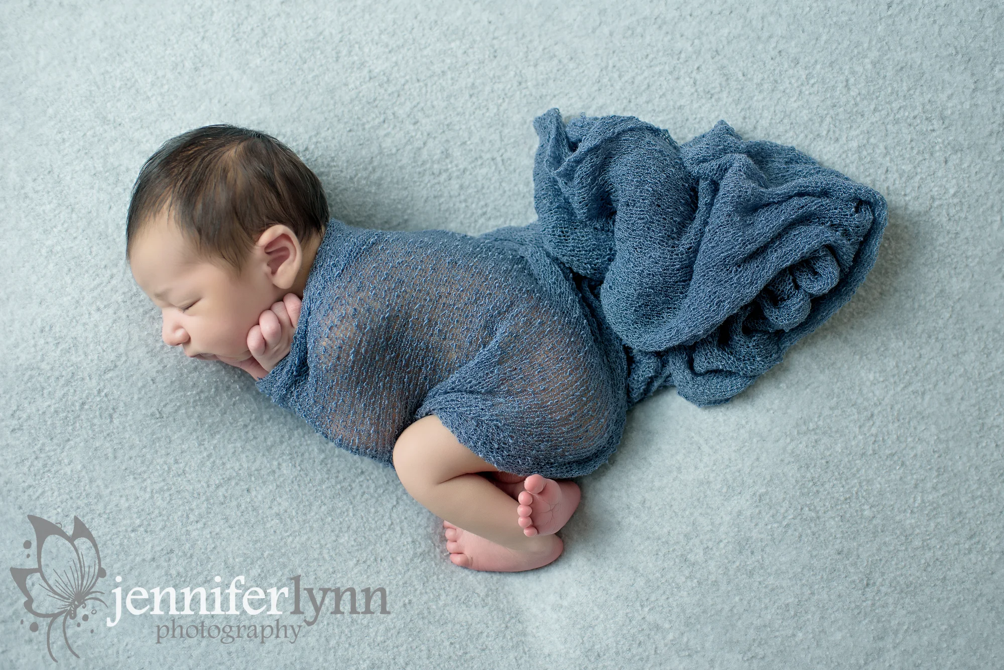 Newborn Boy Grey and Blue Side Laying