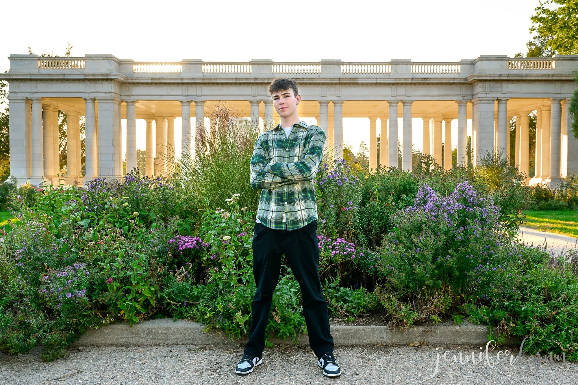 High school senior portrait beside the white columns of the Cheesman Park Pavilion in Denver