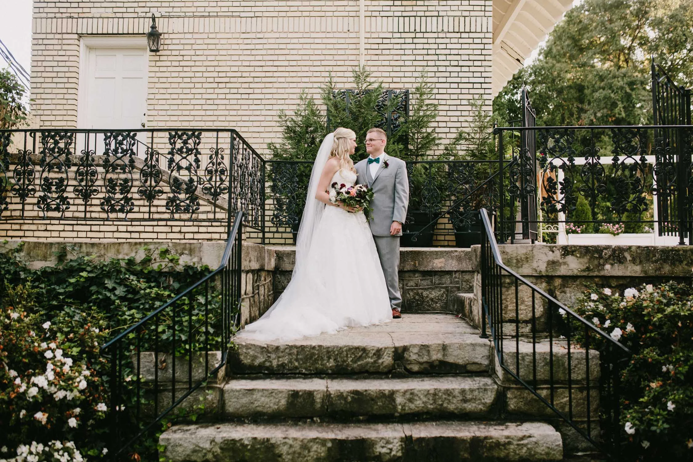Welp, I’m finally catching up to blogging weddings from 2017! If Im being honest, the only reason I haven’t already blogged this lovely wedding is because I thought I already did! It definitely deserves to be shown off. Stephanie and Chris are such sweet and relaxed people - I had so much fun photographing them on top of Craggy. You can view it here ! Their vision for their wedding incorporated blue stones and breathtaking, colorful florals, and if was perfect for their fall wedding. Separk as a backdrop is everything, the natural light, the secret garden feel, the gorgeous stone? Wut. Not to mention their team is so kind and on top of things, making sure the day flows perfectly. I can’t wait for you to see this wonderful day from start to finish. Vendors: Venue: Separk Mansion Hair and Make Up: Mirror Bomb Coordinating: Separk Mansion Cake: Sky’s The Limit Dress: Pronovias Place Cards: Hanwriting Florals: New Creations Flowers DJ: Split Second Sound Second Photographer: E. Henigan Studios