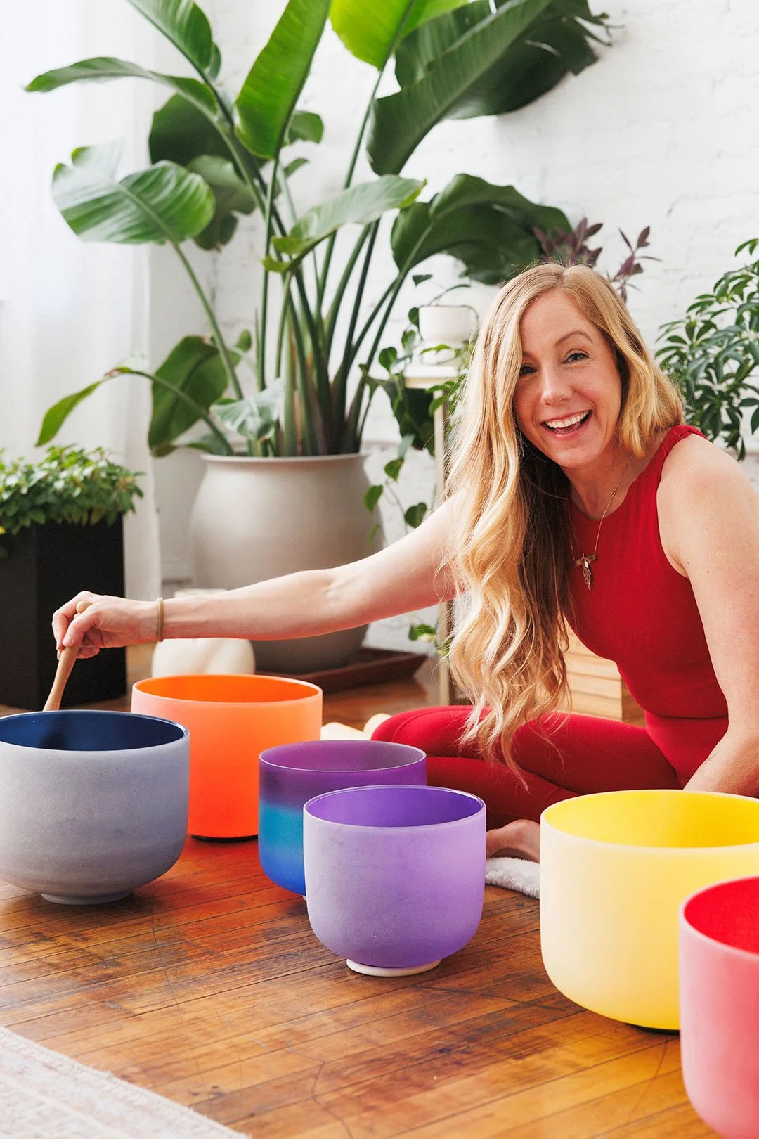 Ashley Logan playing crystal alchemy bowls