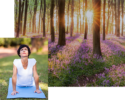 woman sun salutation and Sunlight through trees with spring flowers