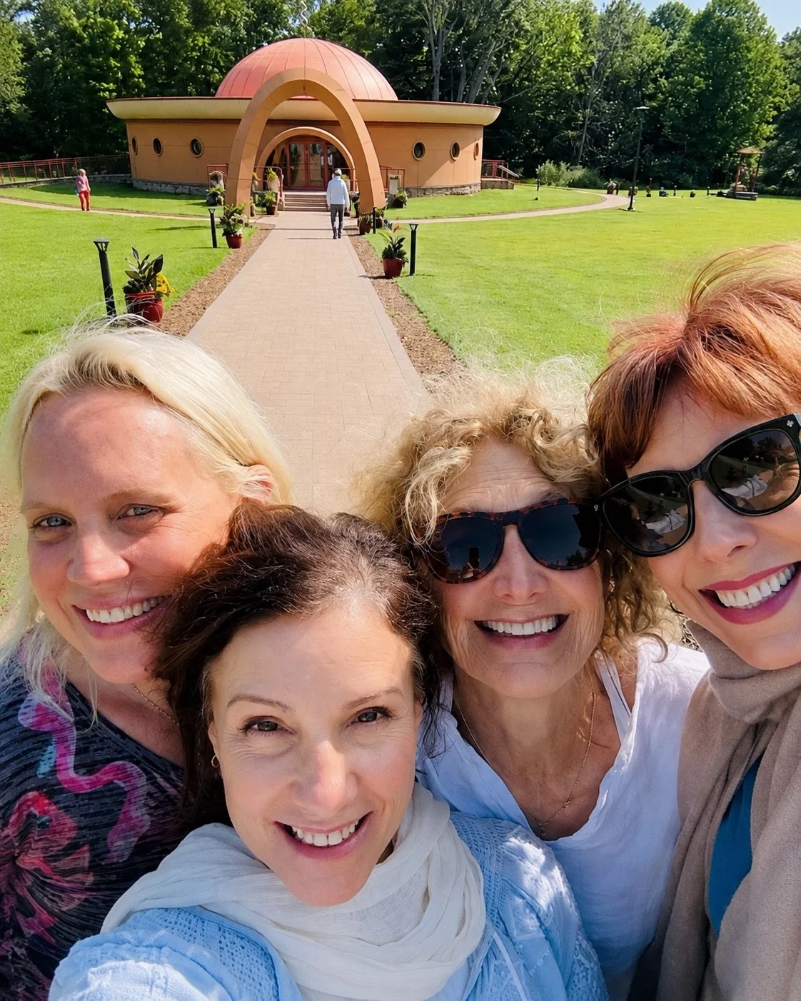 Laura Jane with fellow yoga practitioners outside the Sri Vidya Shrine at the Himalayan Institute