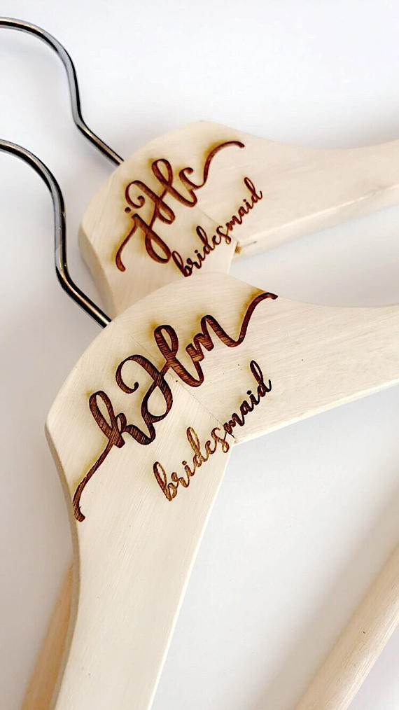 Custom engraved wood hanger from deco ink designs $10.00