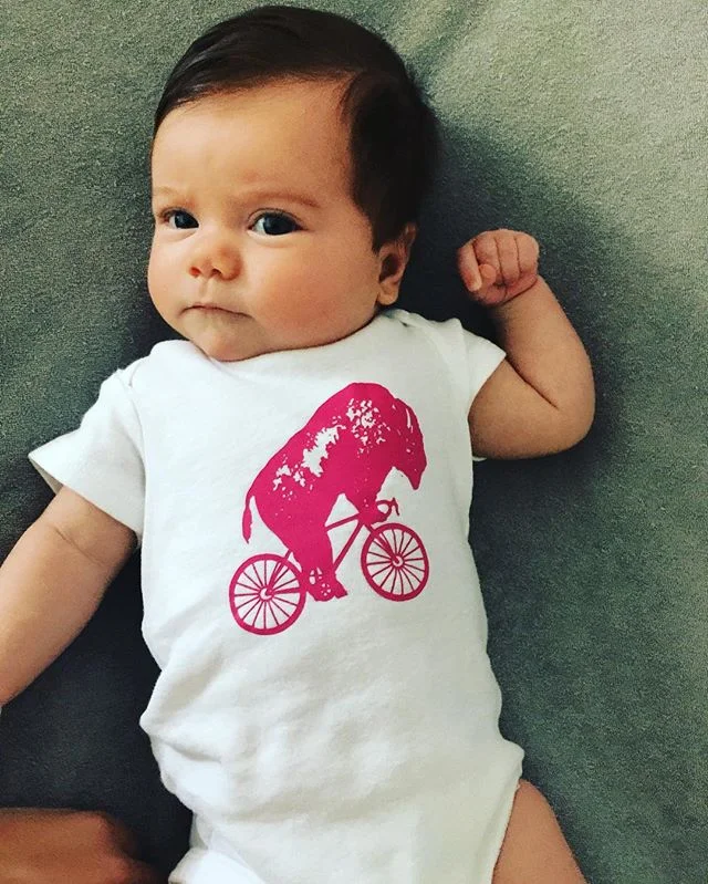 Cuteness factor 💯. #bikeitBuffalo #onesie #onesiegamestrong #buffalove @cathybromley84