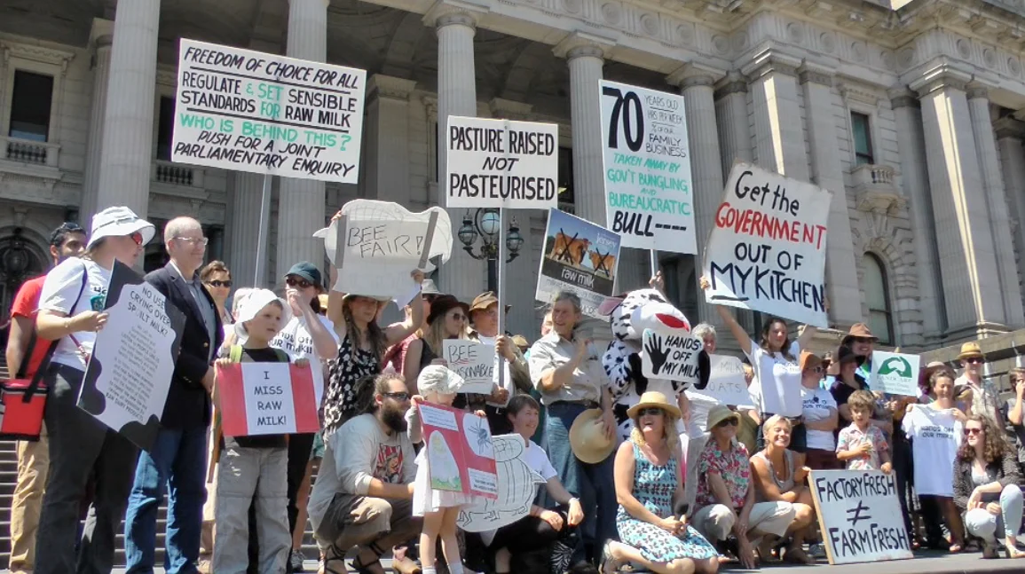 Eat Buy Grow rally group photo with placards