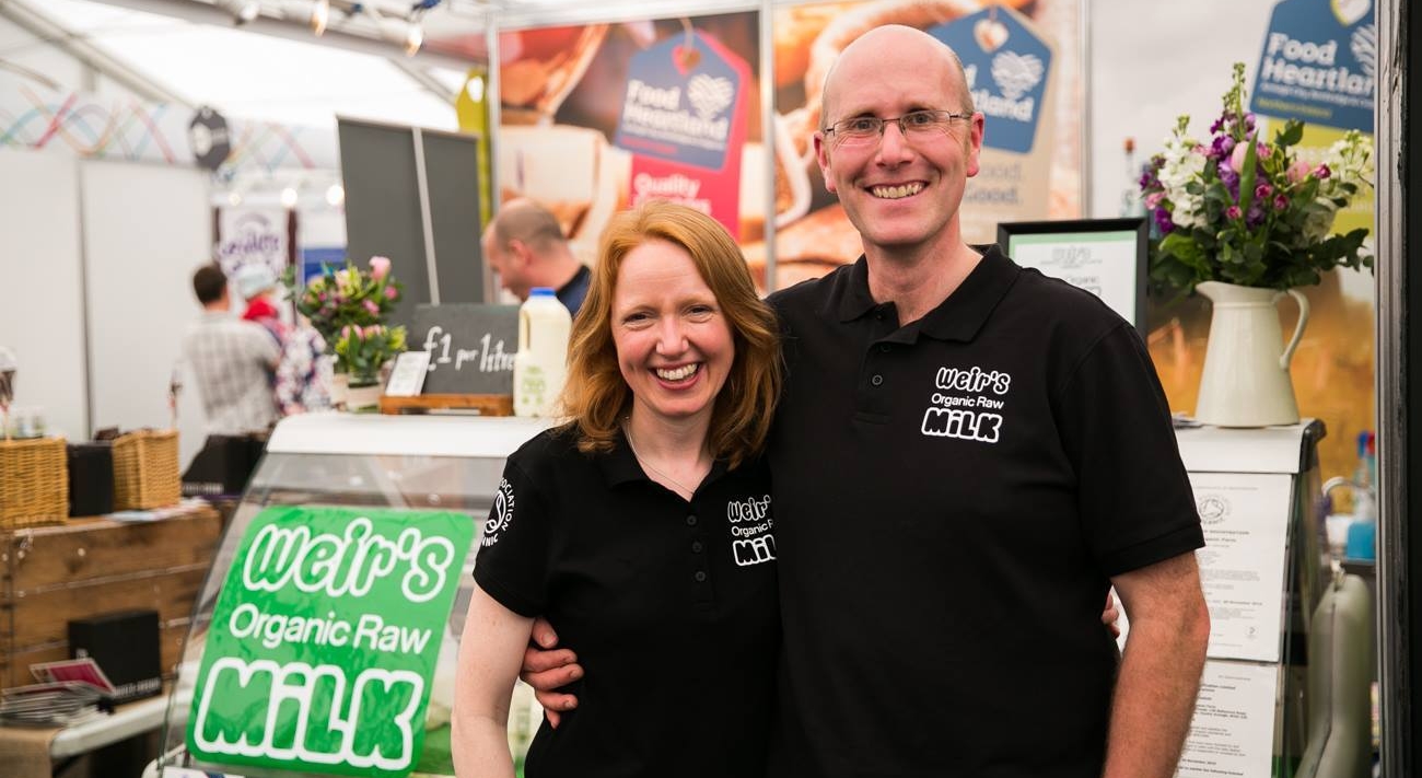 Image: Weir's Organic Raw Milk was voted Best Food and Drink Product by food writers at the Balmoral show, May 2017 with Deane and Kerrie.