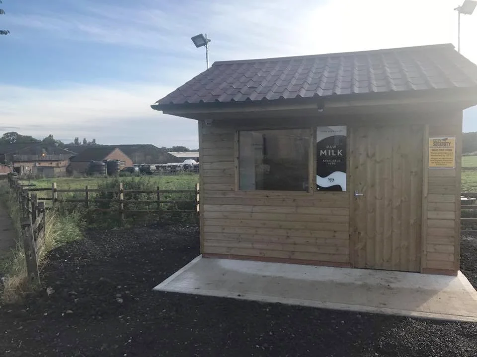 Image: the shed with the Milkbot supplying raw milk directly from the farm gate.