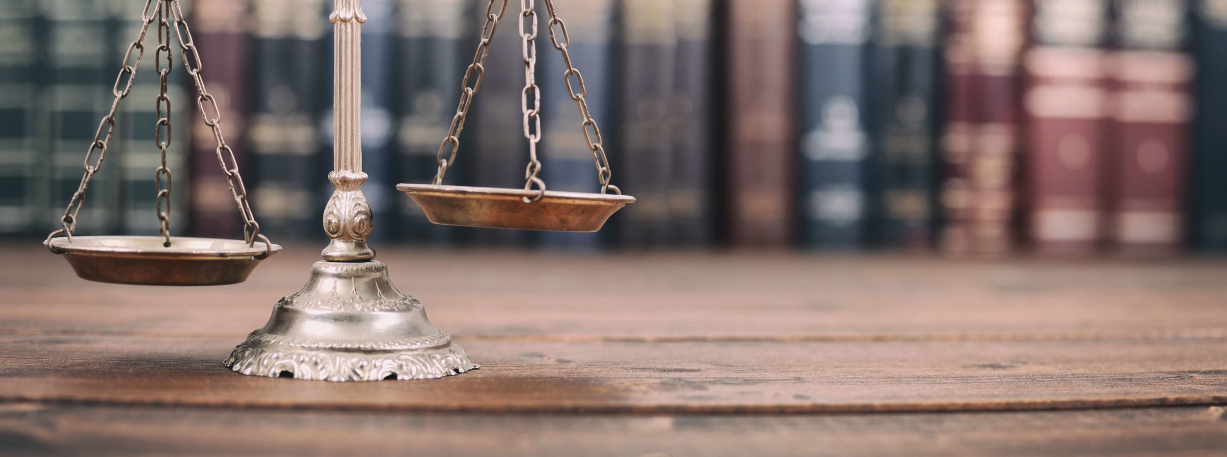 AdobeStock_200849637 scales of justice.jpg