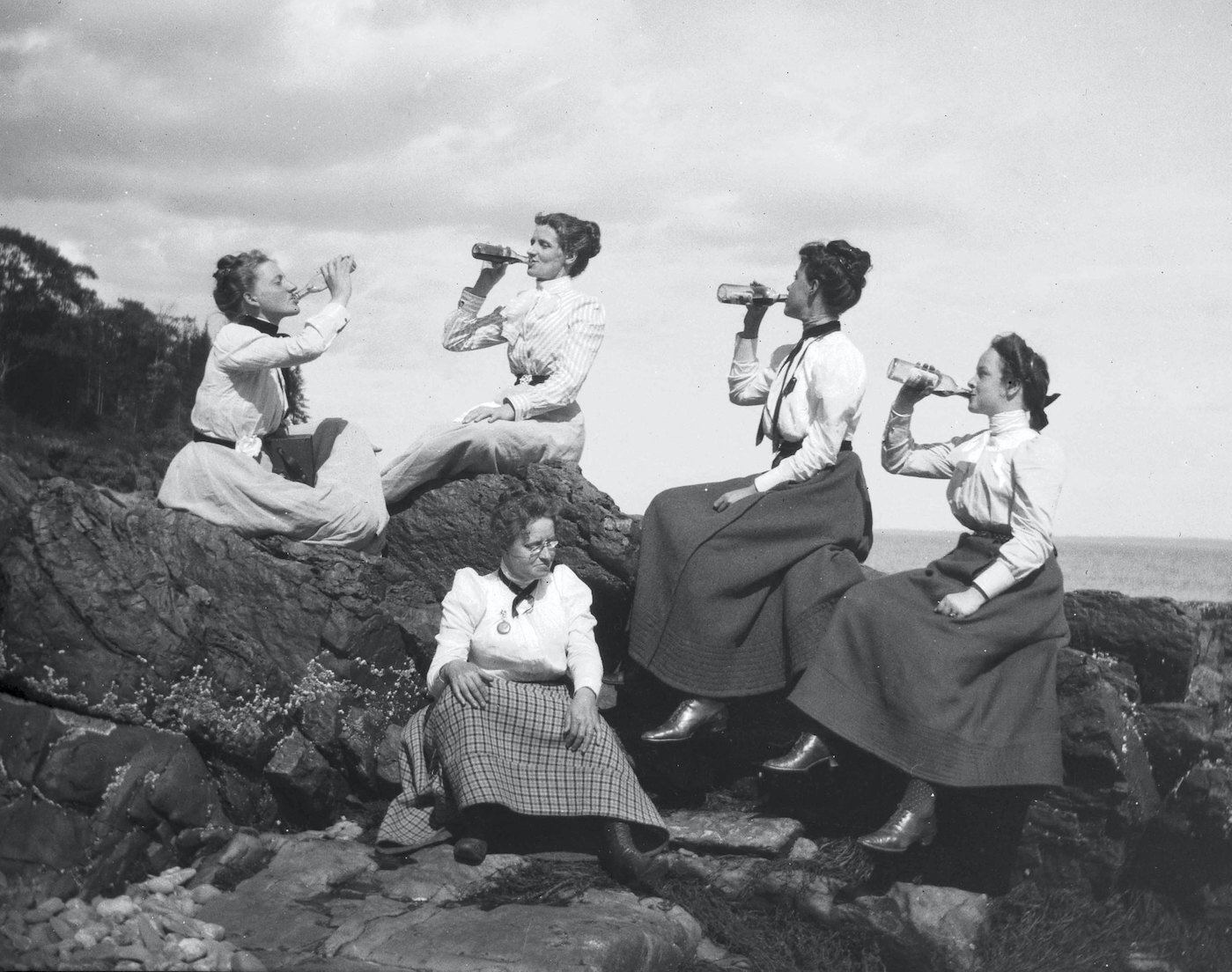 Space - Picnic at Sherman's Point, 1900. Theresa Babb is sat on the rocks second from the left. Taken by Babb.jpeg