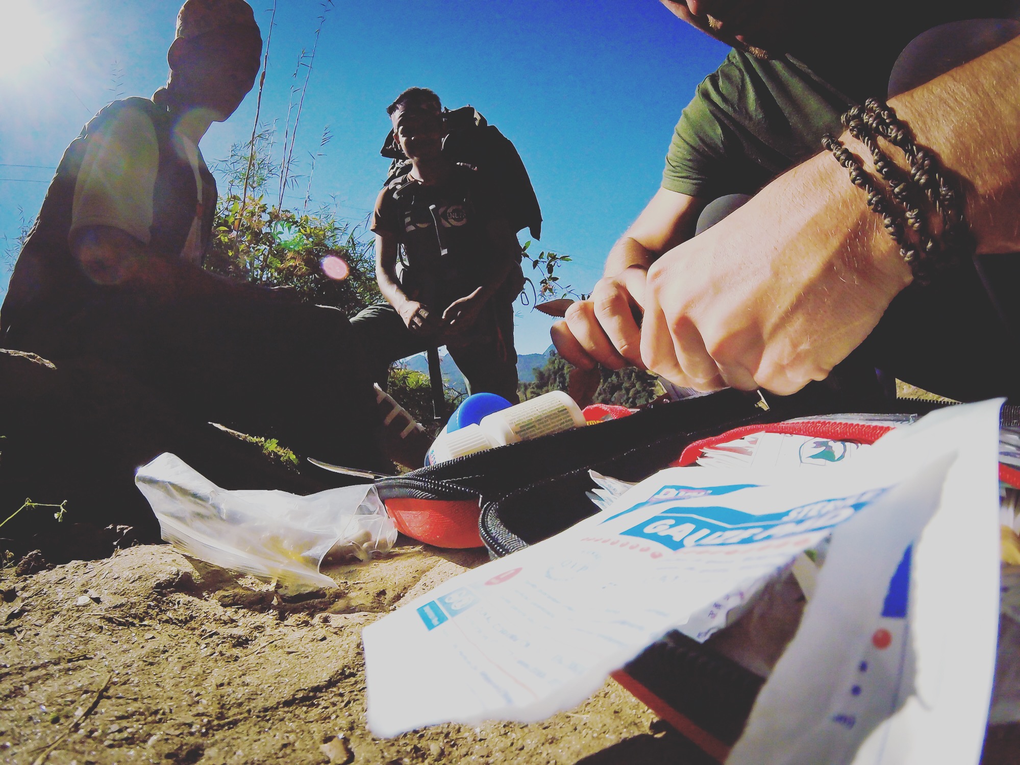 Nov 10.2, 2016 Coming up the ravine we found a man hunched on a rock holding his water boot in painache. I put my index finger tips together and motioned a break and he shook his head with an agonizing confirmation. A compound fracture, I thought. I took off his boot to only find a small gash. He was able to explain that he had hit a stone step with his shin. We cleaned up the wound, gave him a few days worth of gauze and ointment, and some fresh water. He kissed Jenna’s hand about forty times, making me wonder if the whole thing wasn’t a pretty-lady ploy.