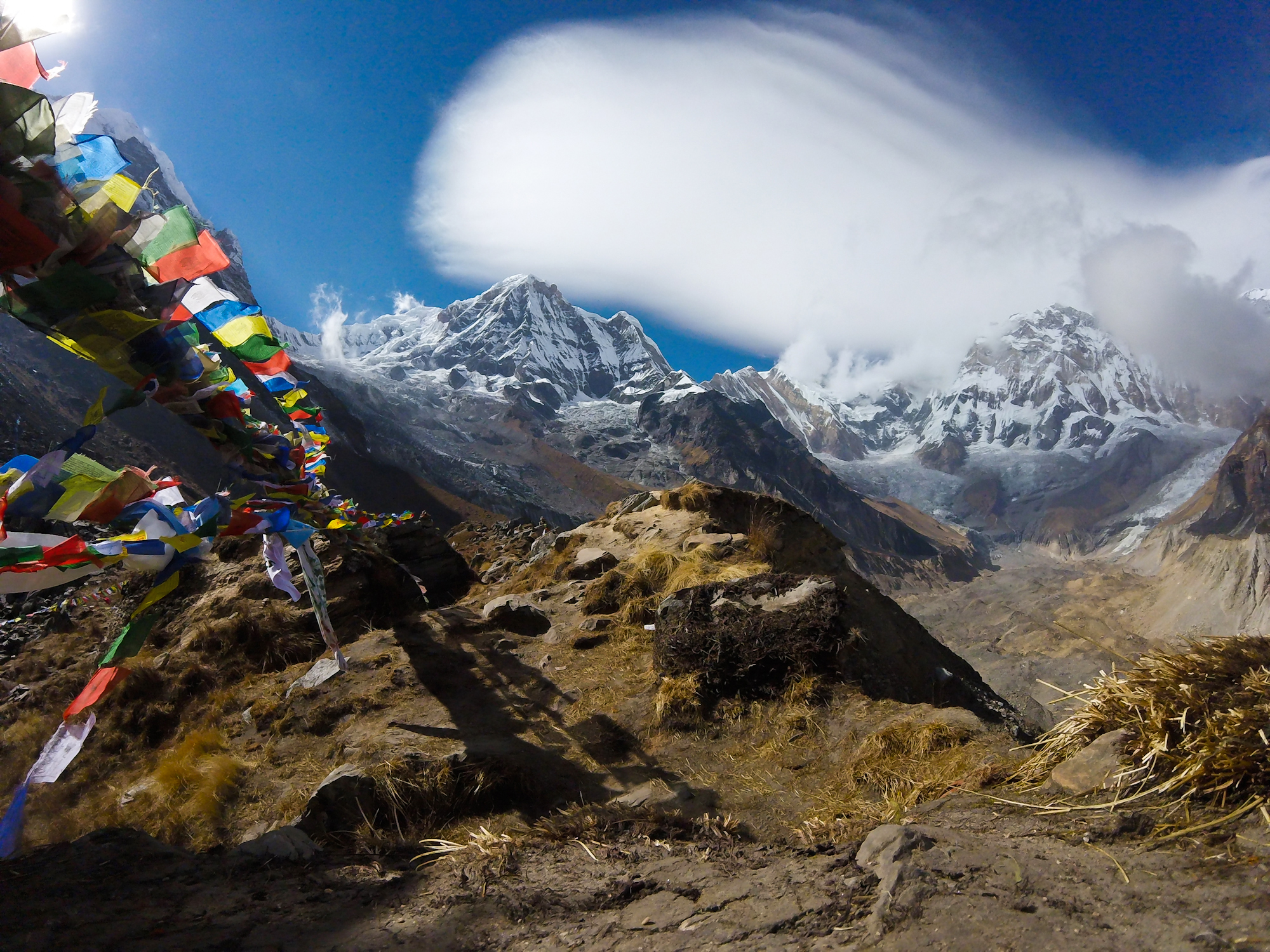 Nov 12.2, 2016 Pictured ahead is Annapurna South, the 101st highest mountain in the world. This place holds an obvious sentiment. Prayer flags fly, cracking in the wind. They are the colors of our elements; of sky, air, fire, water, and earth.