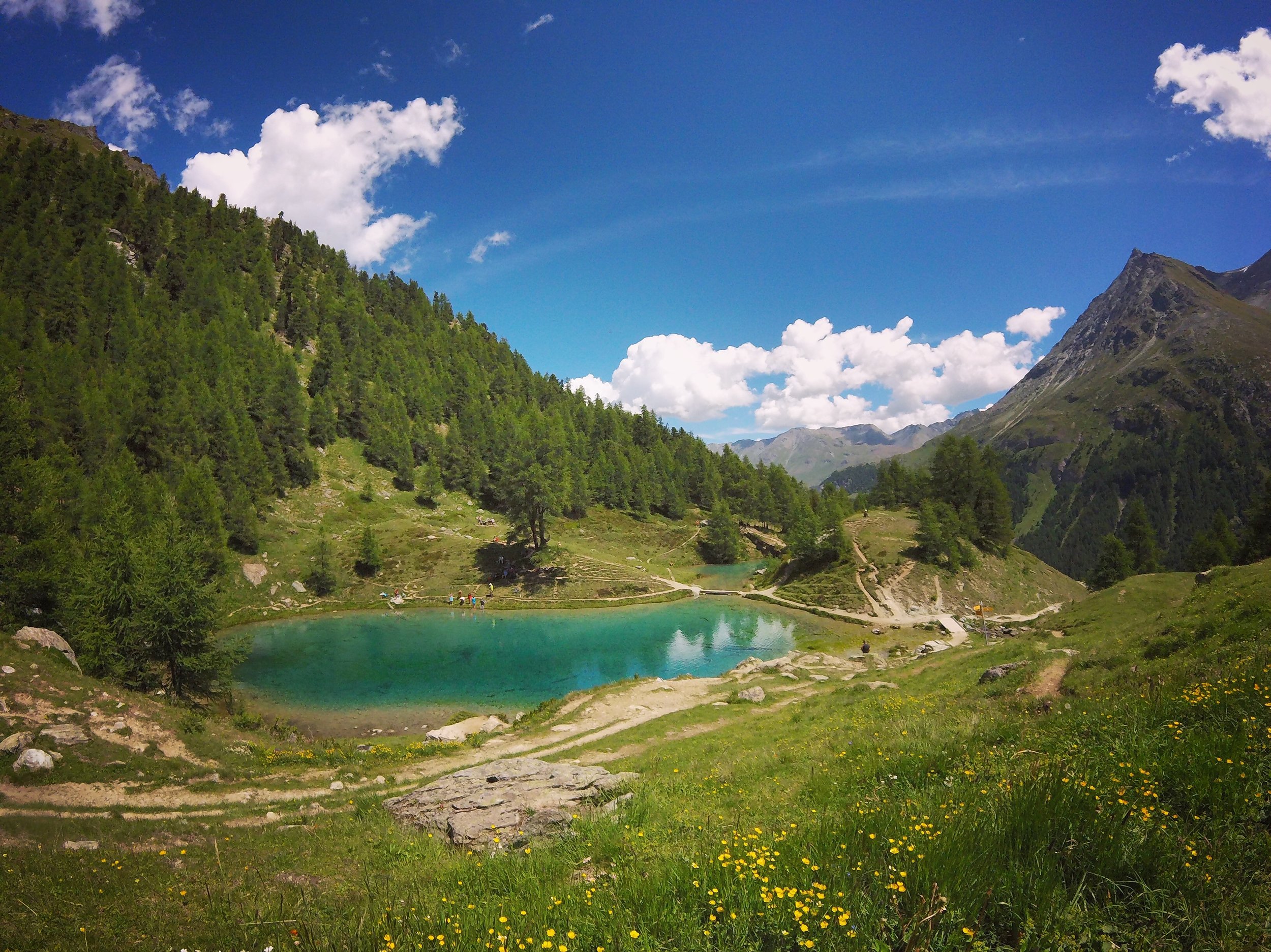 Day 7:&nbsp;Lac Bleu, La Gouille, ArollaLike bad questions, no such thing as wrong turns. Just above 2,000 meters it's a dip for some and dirt for others.