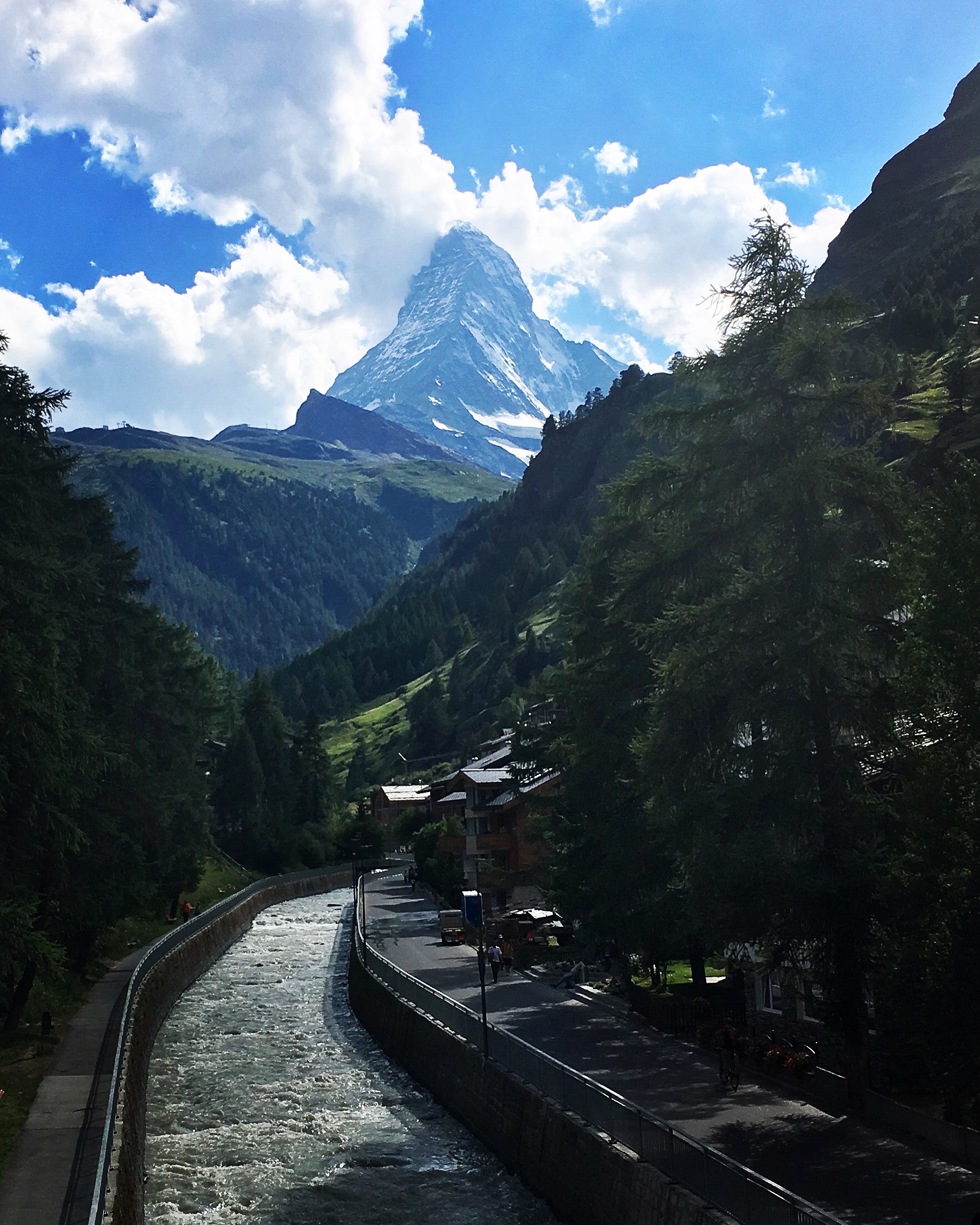 Day 7: Zermatt, Switzerland The Matterhorn stands far beyond the Vispa River. In German, 'Matte' translates to 'meadow' and so it is a meadowed-peak. Named after its approach, not so much it's climb, it represents the northeast precipice of this alpine adventure.