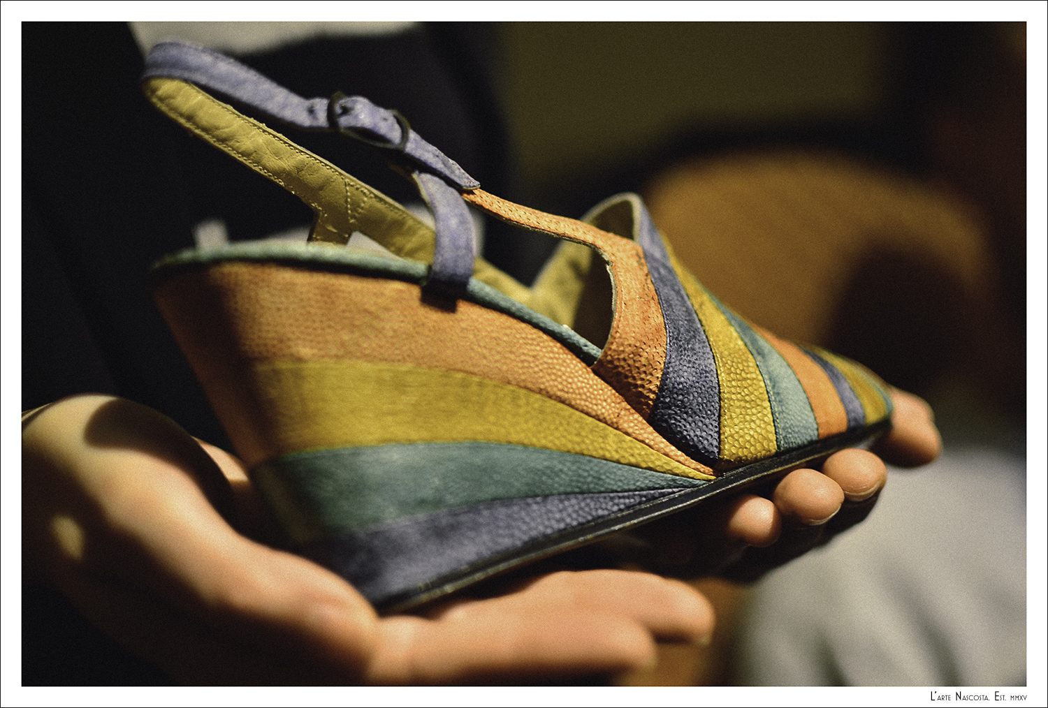 Did you know that Salvatore Ferragamo invented the wedge heal? This is an example made in fish skin - another Ferragamo innovation. 