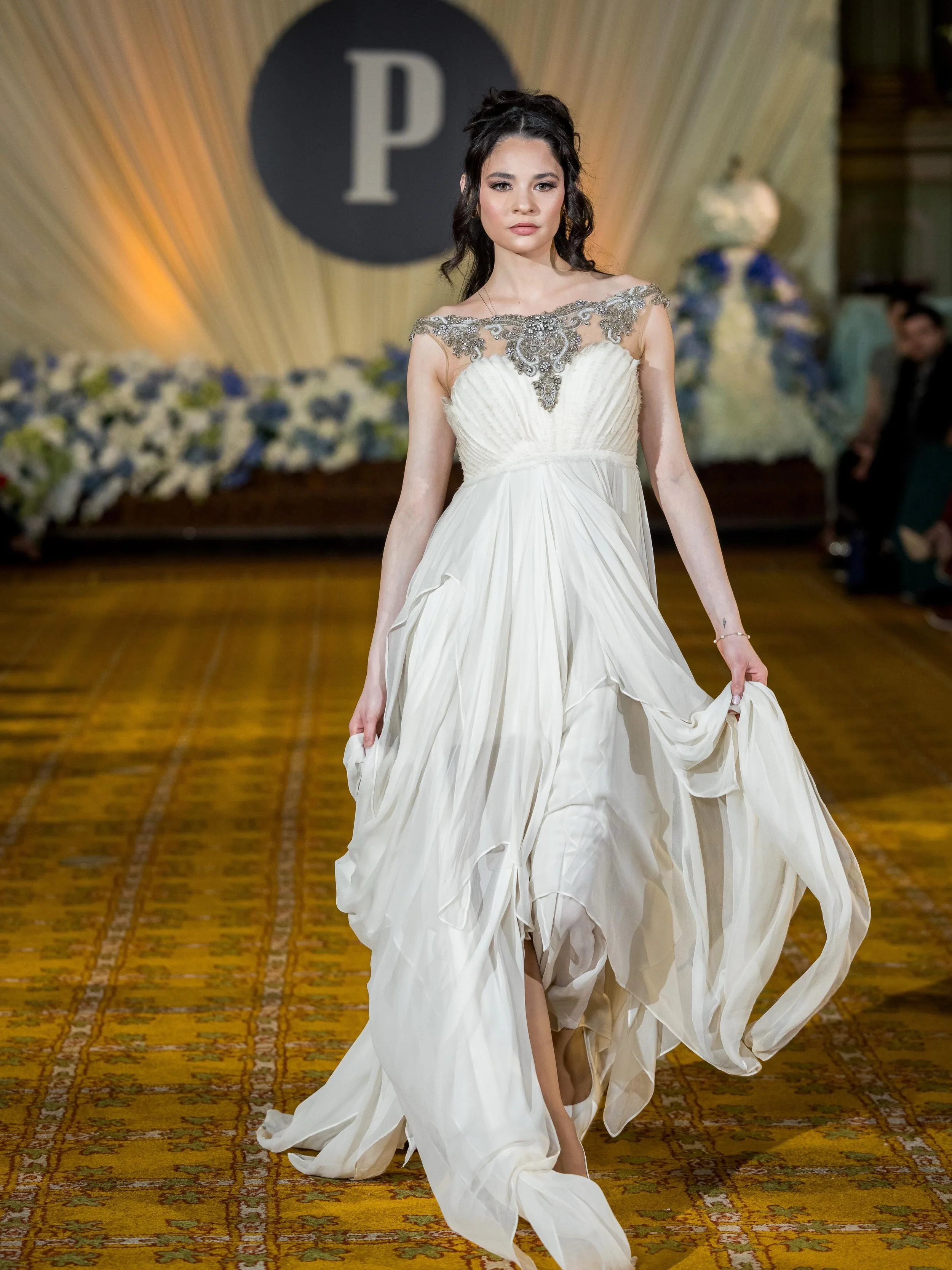 Seairra @arrieas walking for designer @priscilla.couture at @phillymag @philawedding Bubbly Ball 🧡 at @onenorthbroad hair by @alisons_hair makeup by me @kyleryanbeauty representing @beautyandbridalphilly ✨