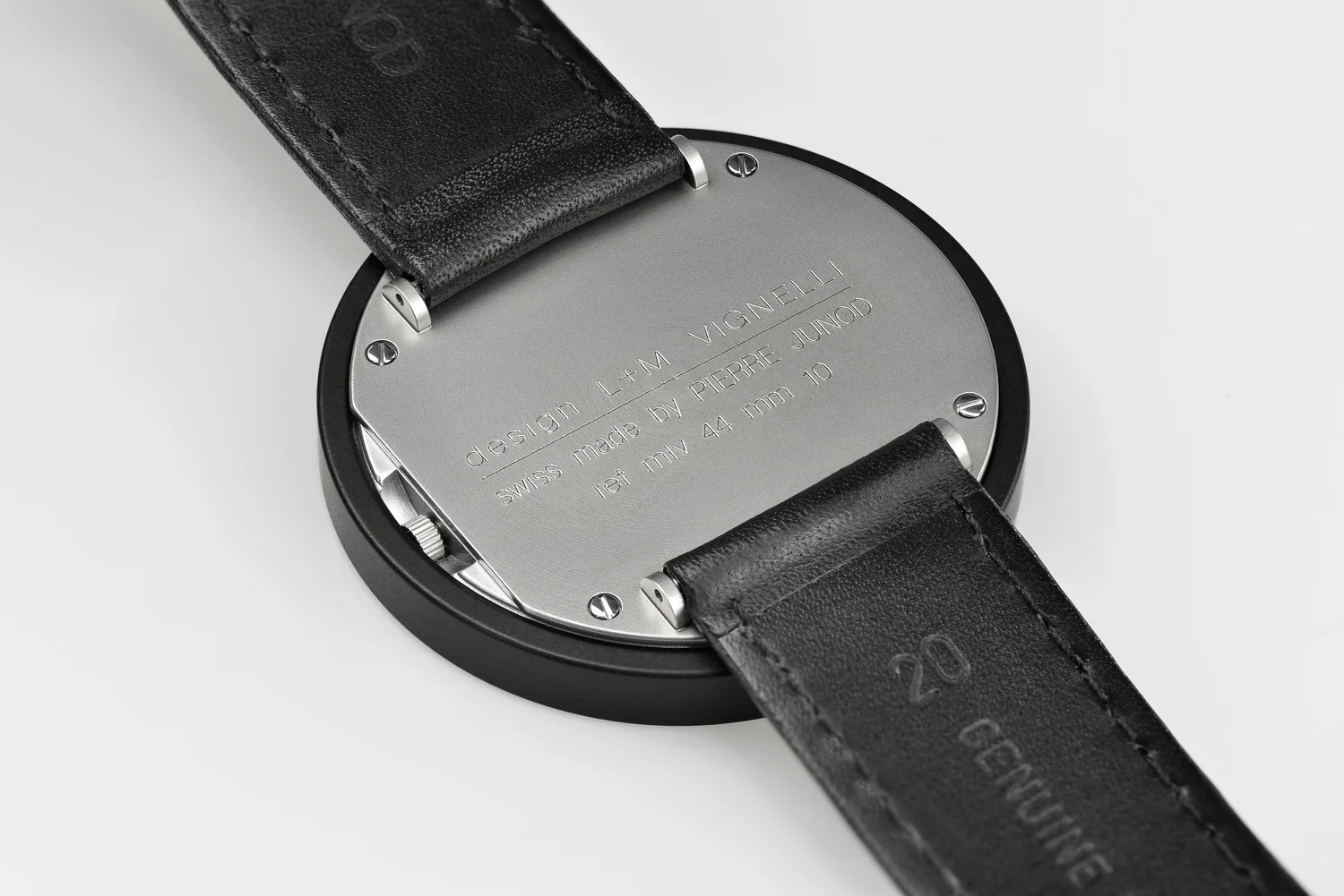 Back of the Vignelli case, engraved