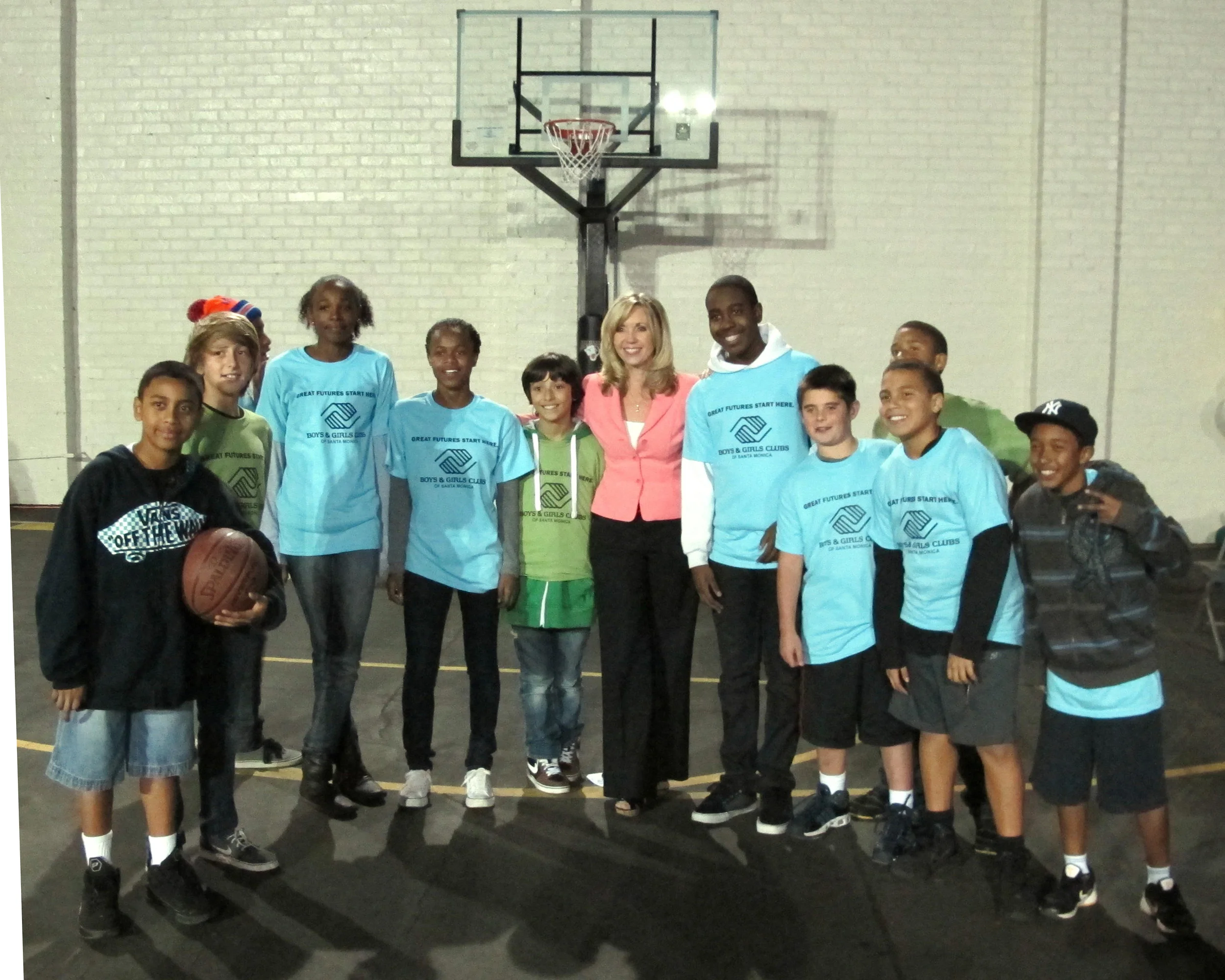  Emceeing unveiling of the new SMBGC sport court made possible by a donation from NBA star LeBron James.