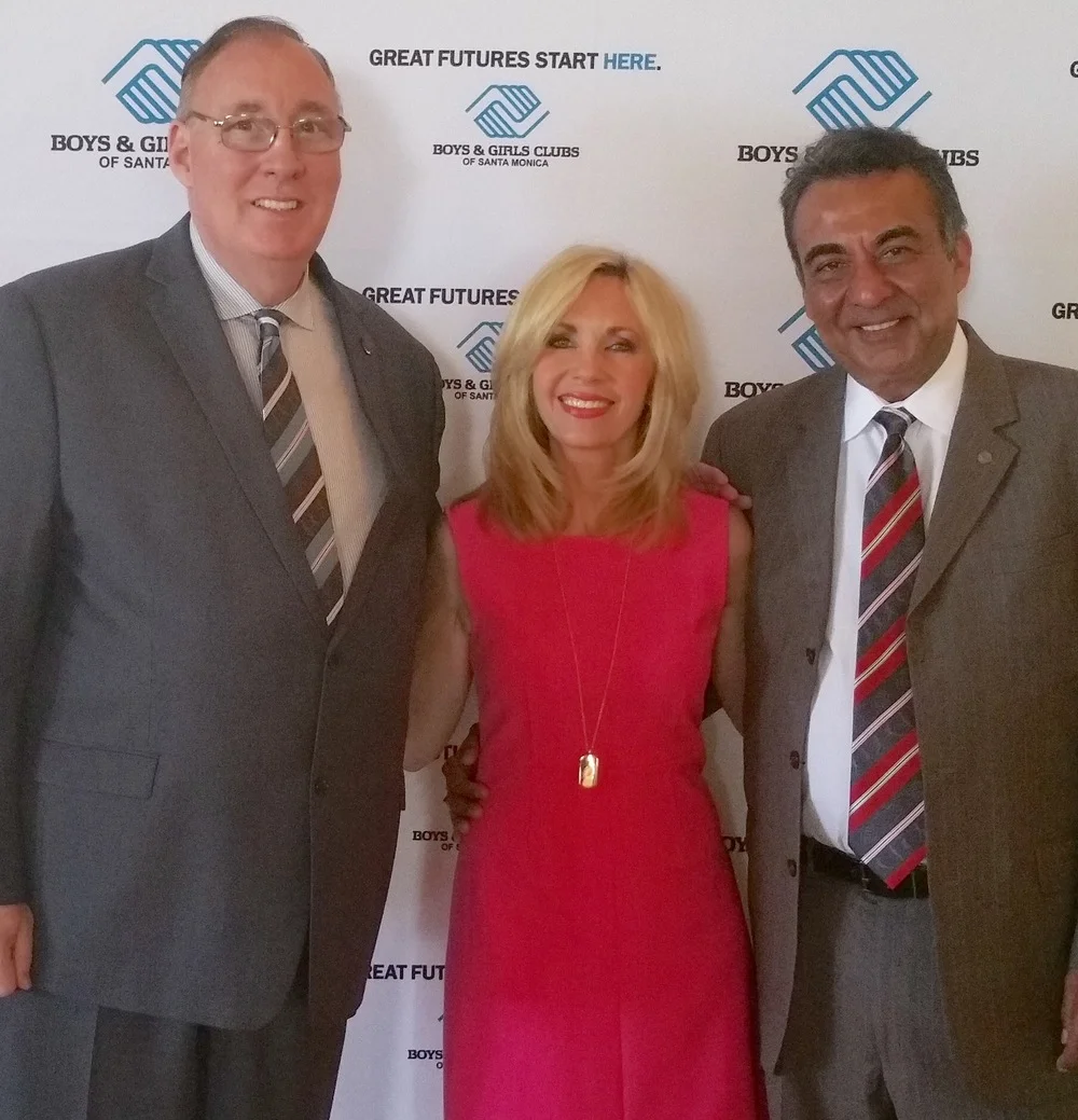 Emcee Deb Carson of SMBGC's First Annual "Great Futures Breakfast, with SMBGC CEO Tim Blaylock (left) and author/activist Azim Khamisa (right), the event's keynote speaker.