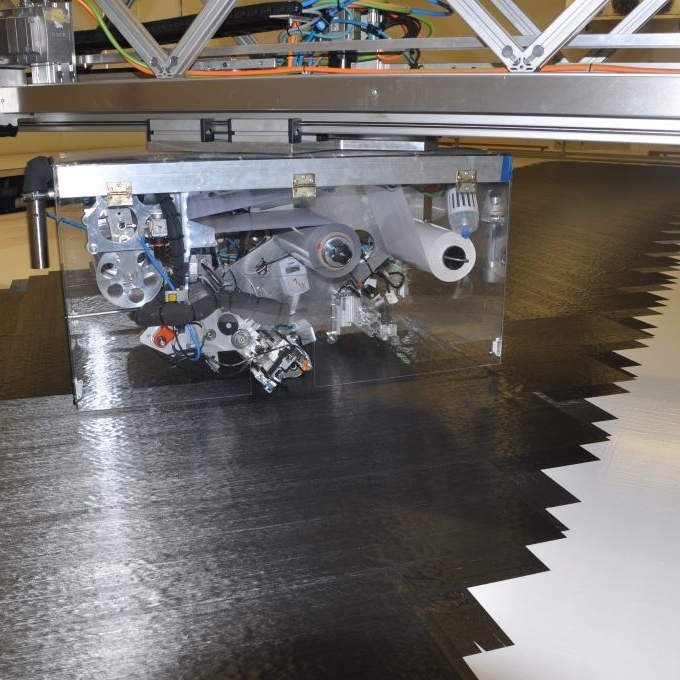 The NTPT Automatic Tape Layer (ATL) can laminate fibre from 30g to 300g at any angle - up to 2000 lin.m. of laminate can be laminated in a day.