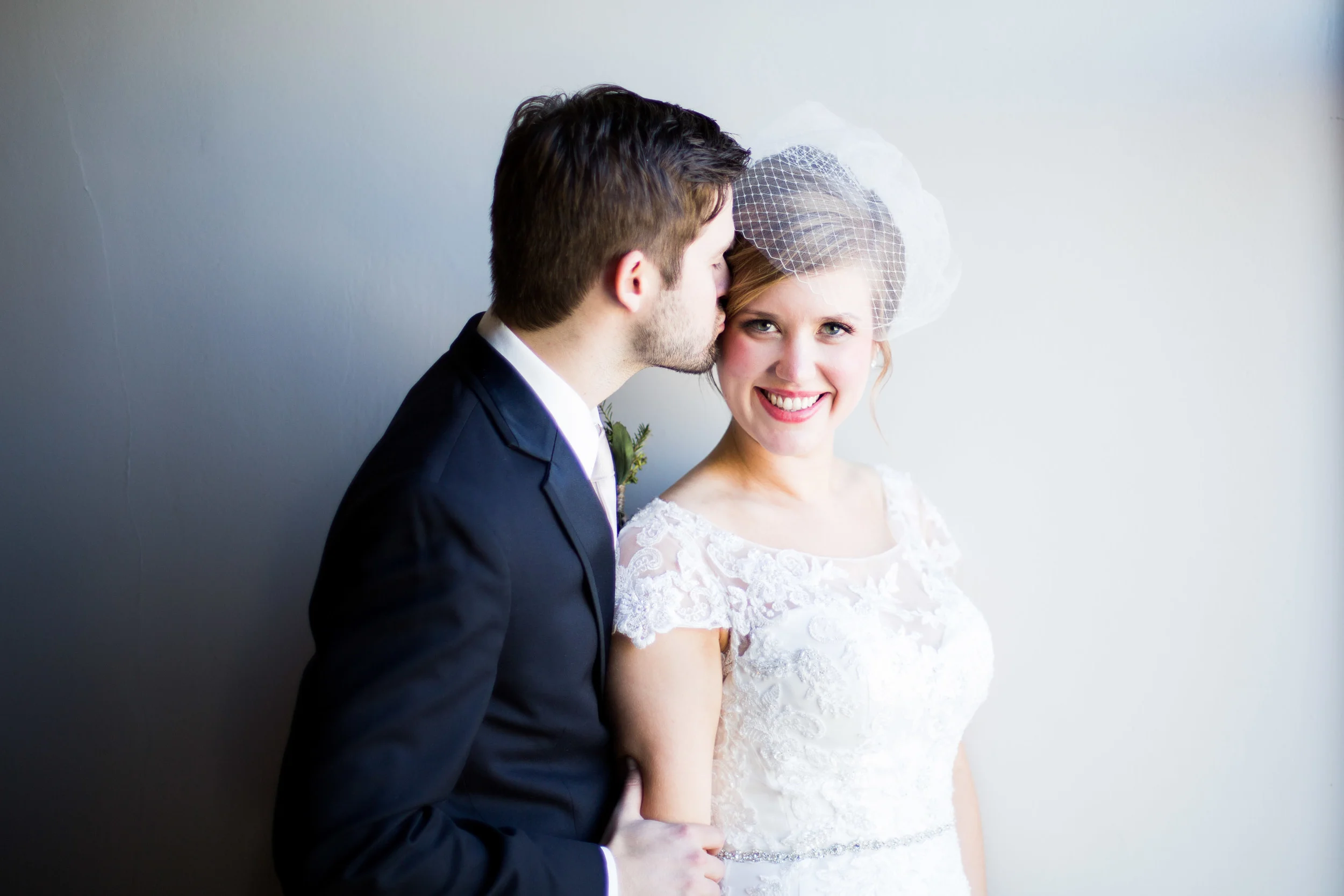 Emily & Broc | A Wintery Paola Town Square Wedding 