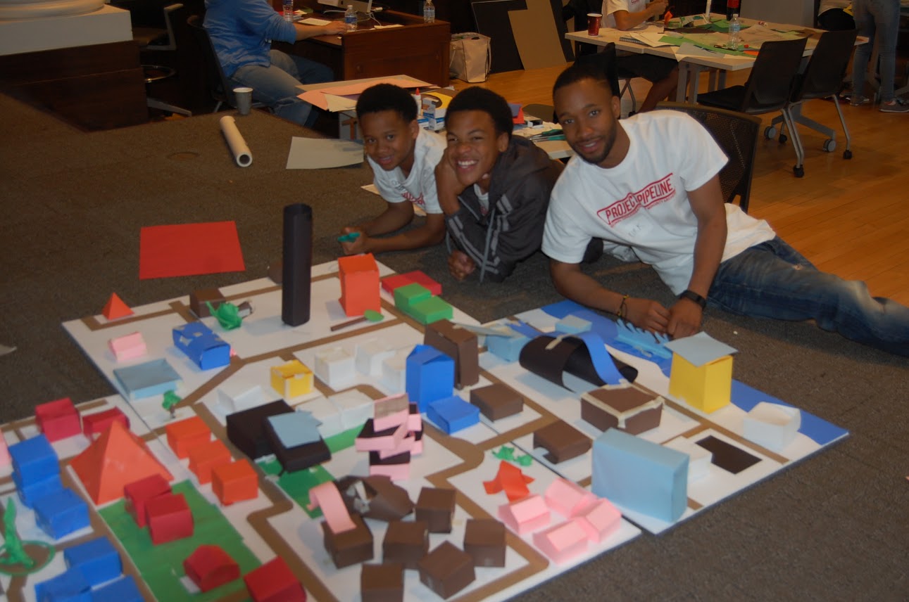 Students work in teams with a mentor to create their designs.